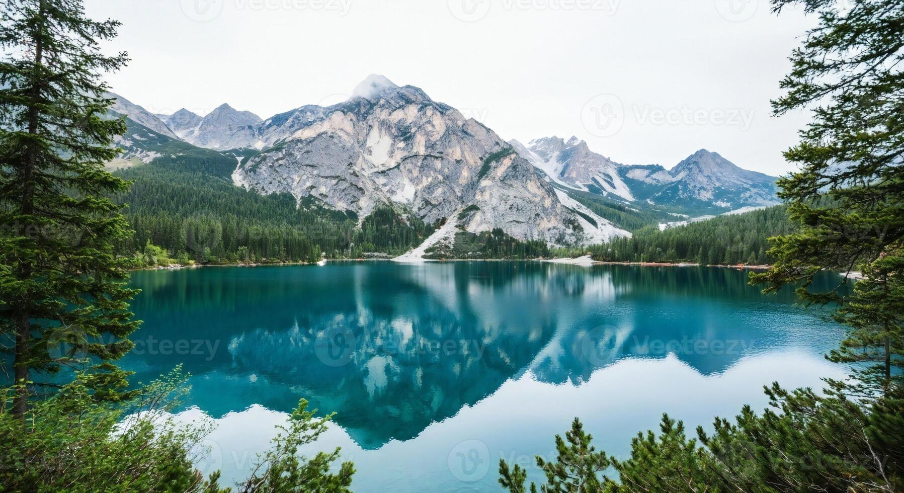 1797x980 Nature background, Nature wallpaper, Pristine turquoise alpine lake reflecting snow capped mountains and evergreen forest under a pale sky