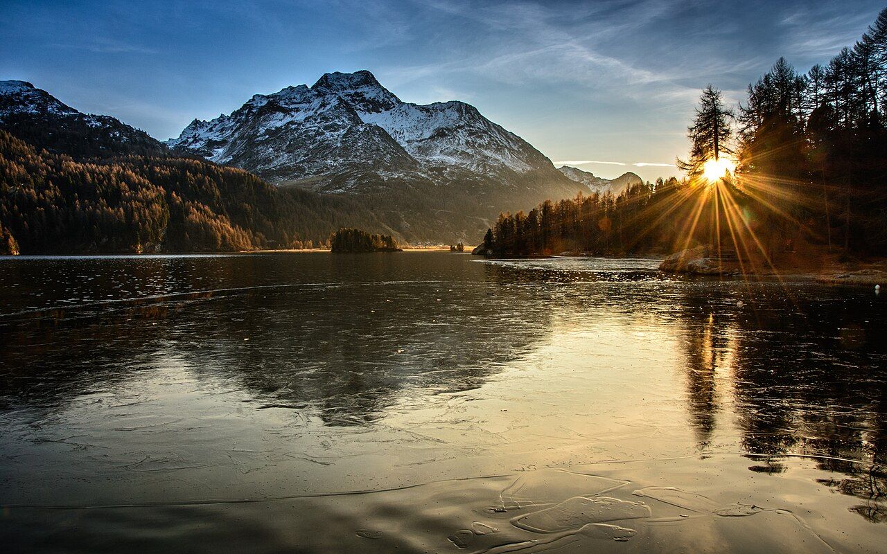 1280x800 Alps of Switzerland Sunset over Lake