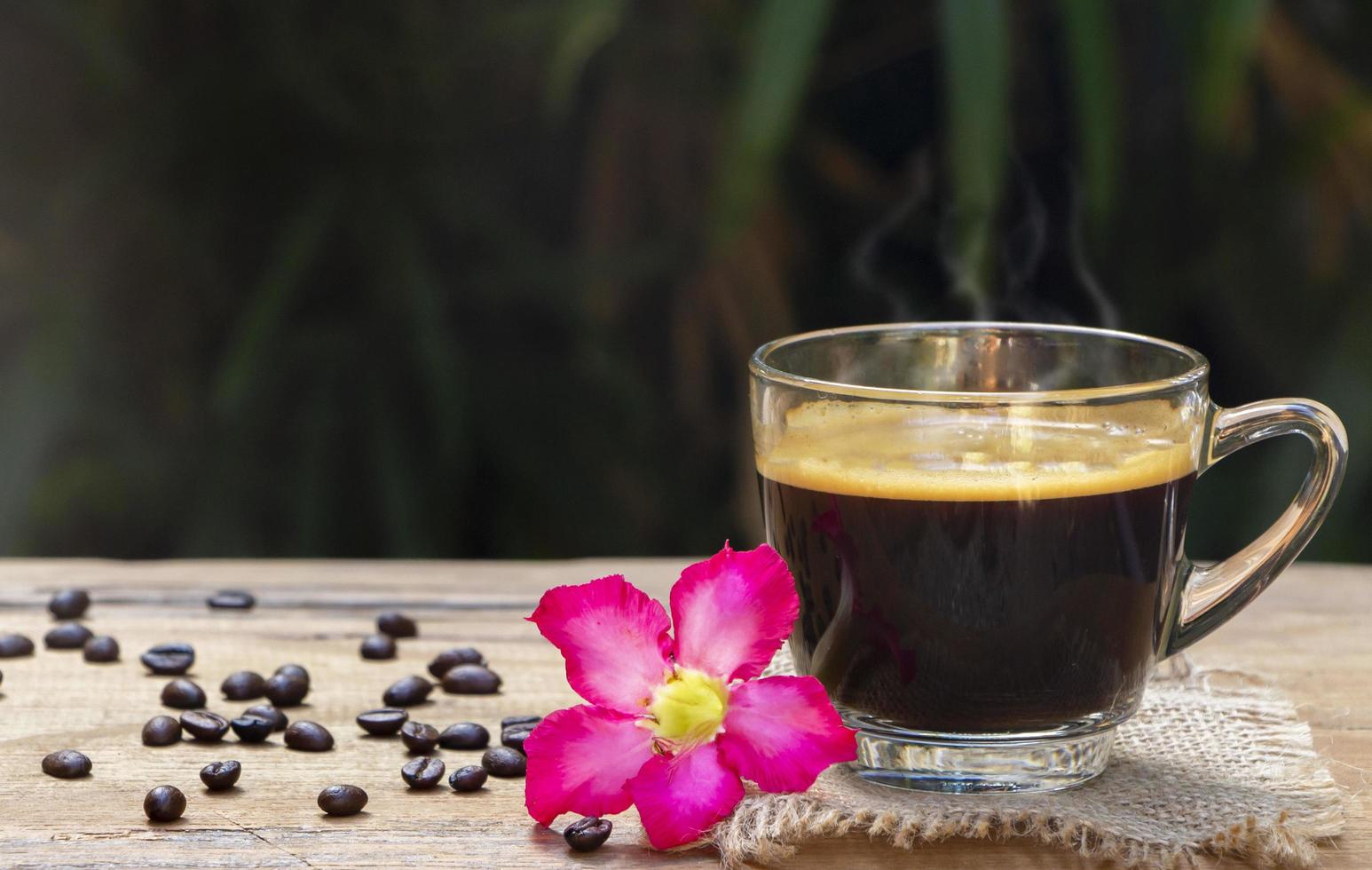 1546x980 cup of hot black americano coffee with nice smoke above a cup on a sackcloth and wooden table in a natural background. Good morning with a refreshment drinks concept 8977624