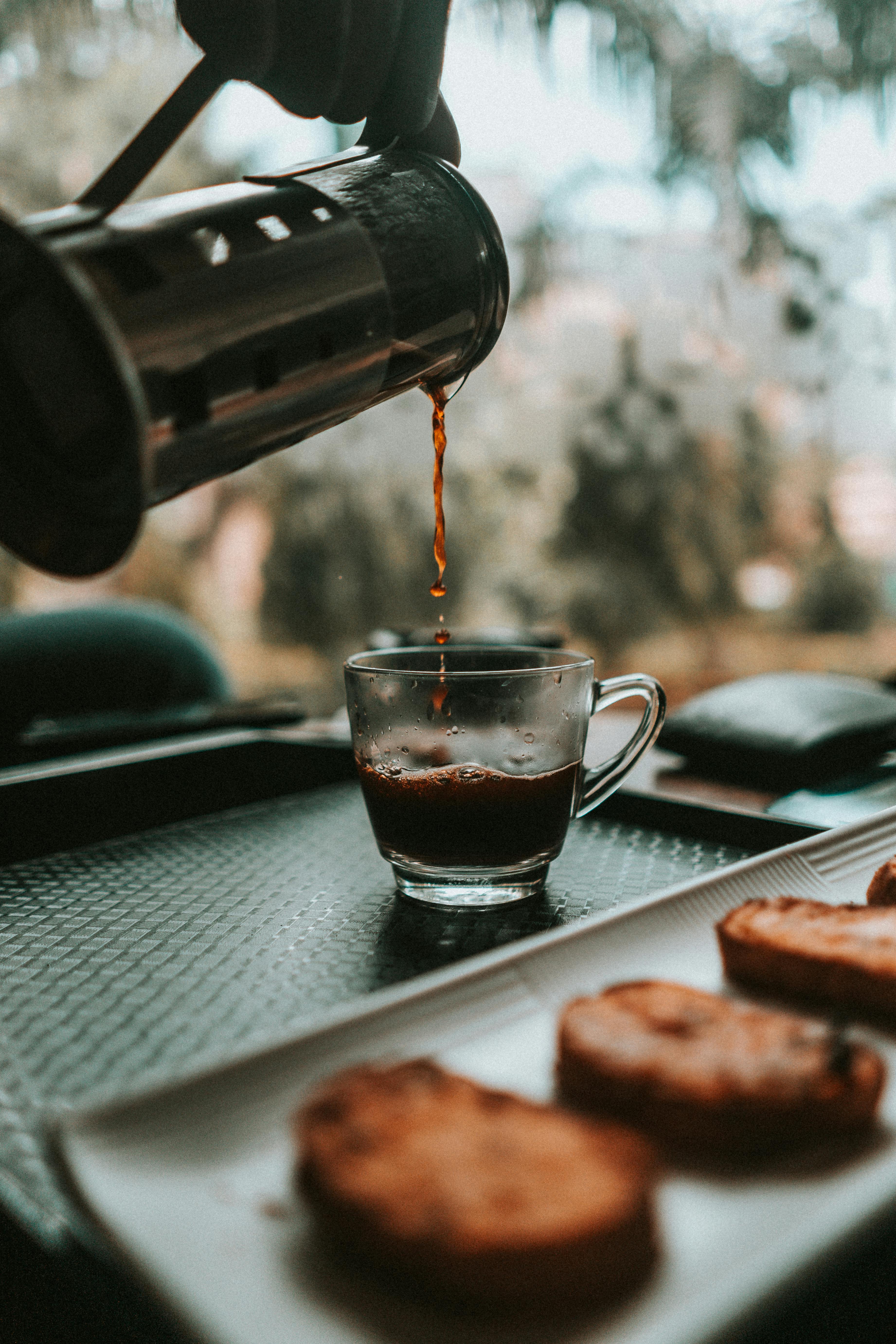 3684x5526 Pouring Coffee In Clear Glass Mug · Free