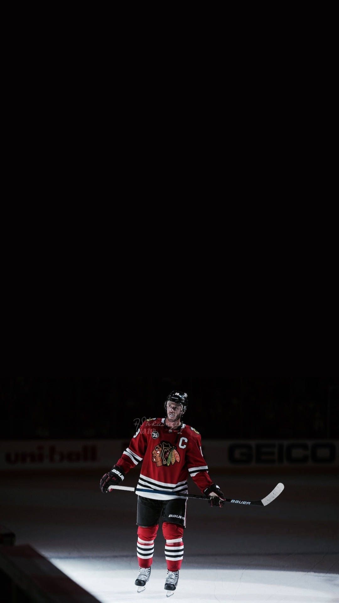 1080x1920 Download Chicago Blackhawks captain, Jonathan Toews, in action on the ice. Wallpaper
