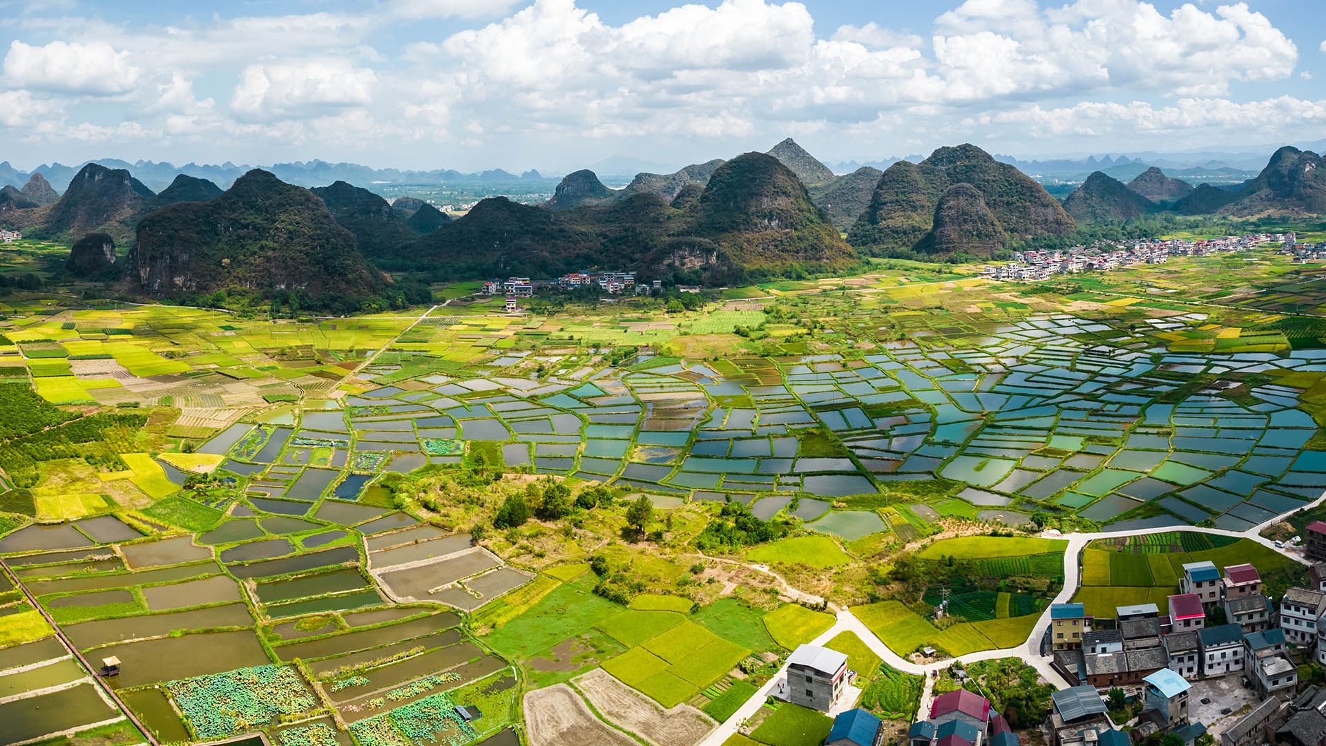 1920x1080 Aerial view of great landscape, glass fields at Huixian Town, Guilin, China. Windows Spotlight Image