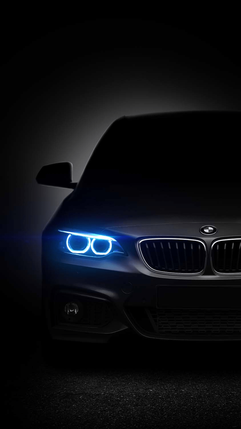 844x1500 BMW German Luxury Cars Brands Bright Blue Headlights Dark Front View