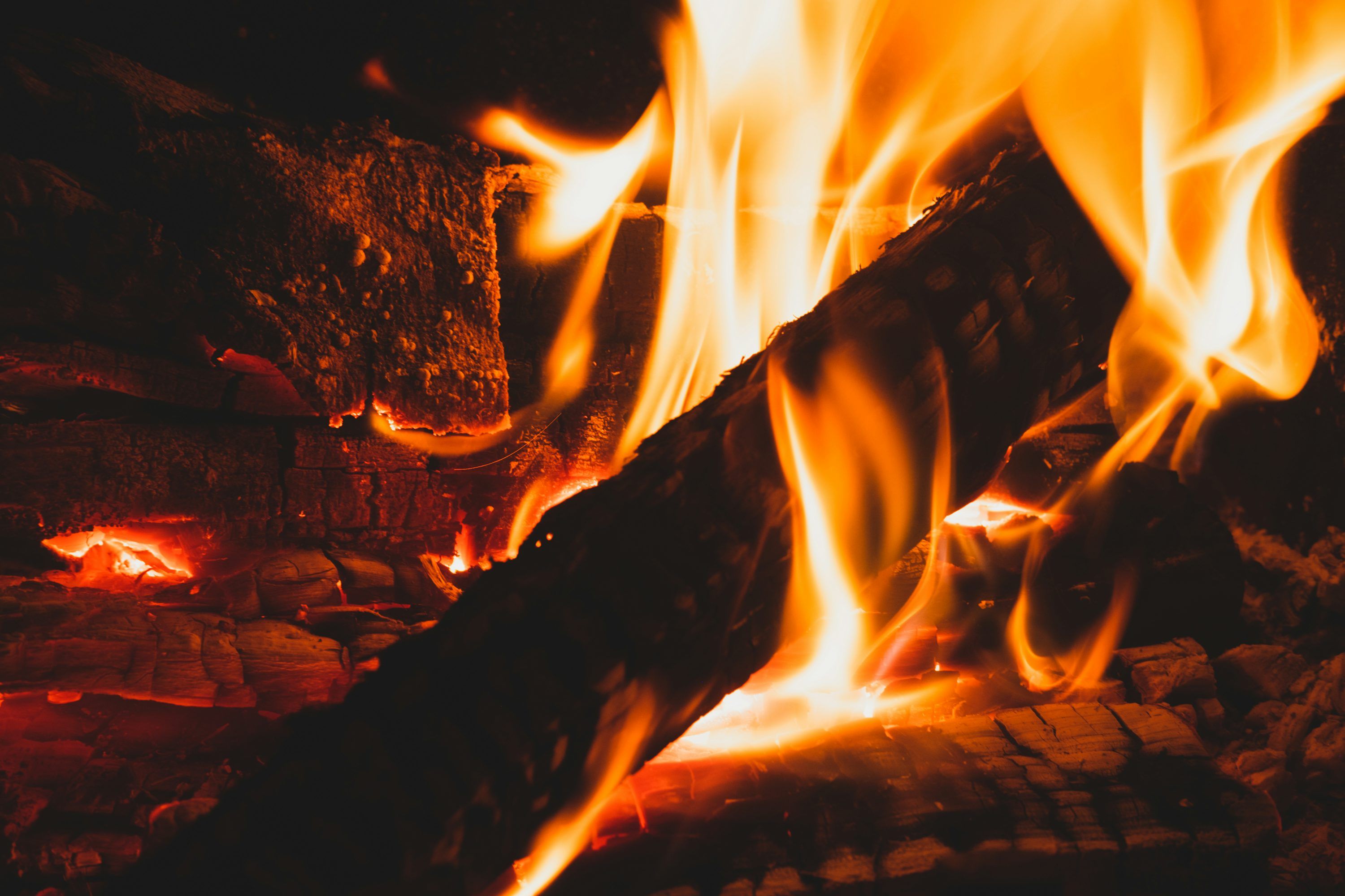 3000x2000 Burning wood in fire pit photo