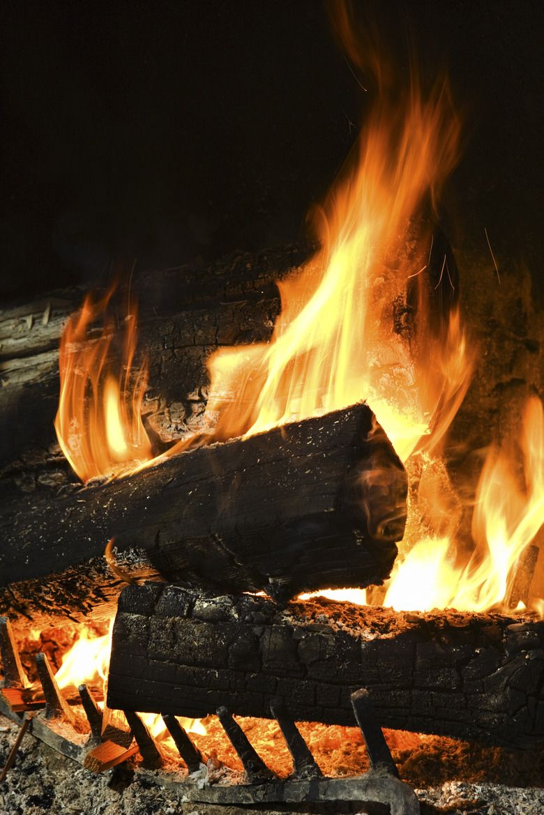 780x1169 Why Does Wood Spark In The Fireplace?