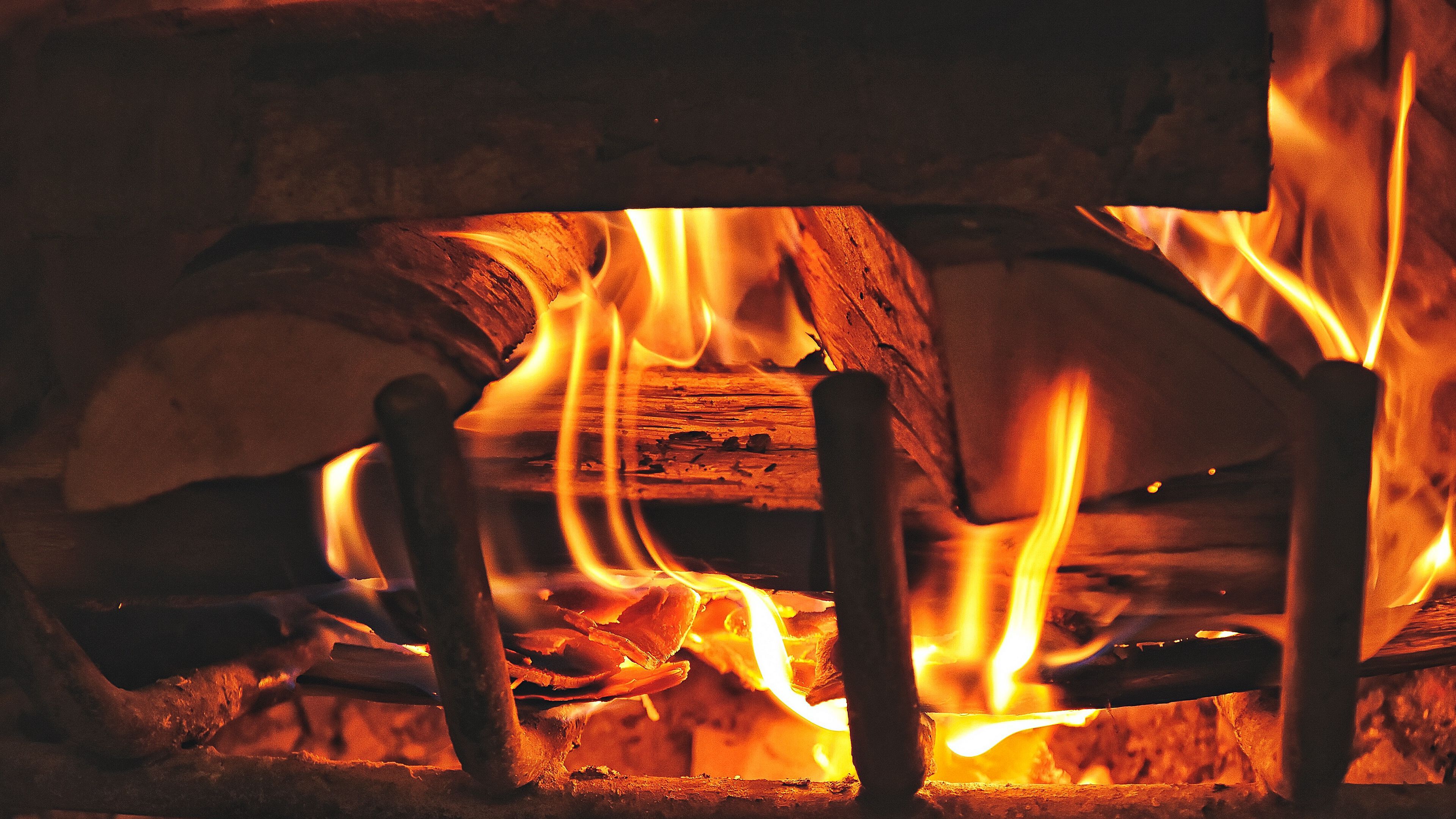 3840x2160 Download wallpaper 3840x2160 fireplace, fire, firewood 4k uhd 16:9 HD background