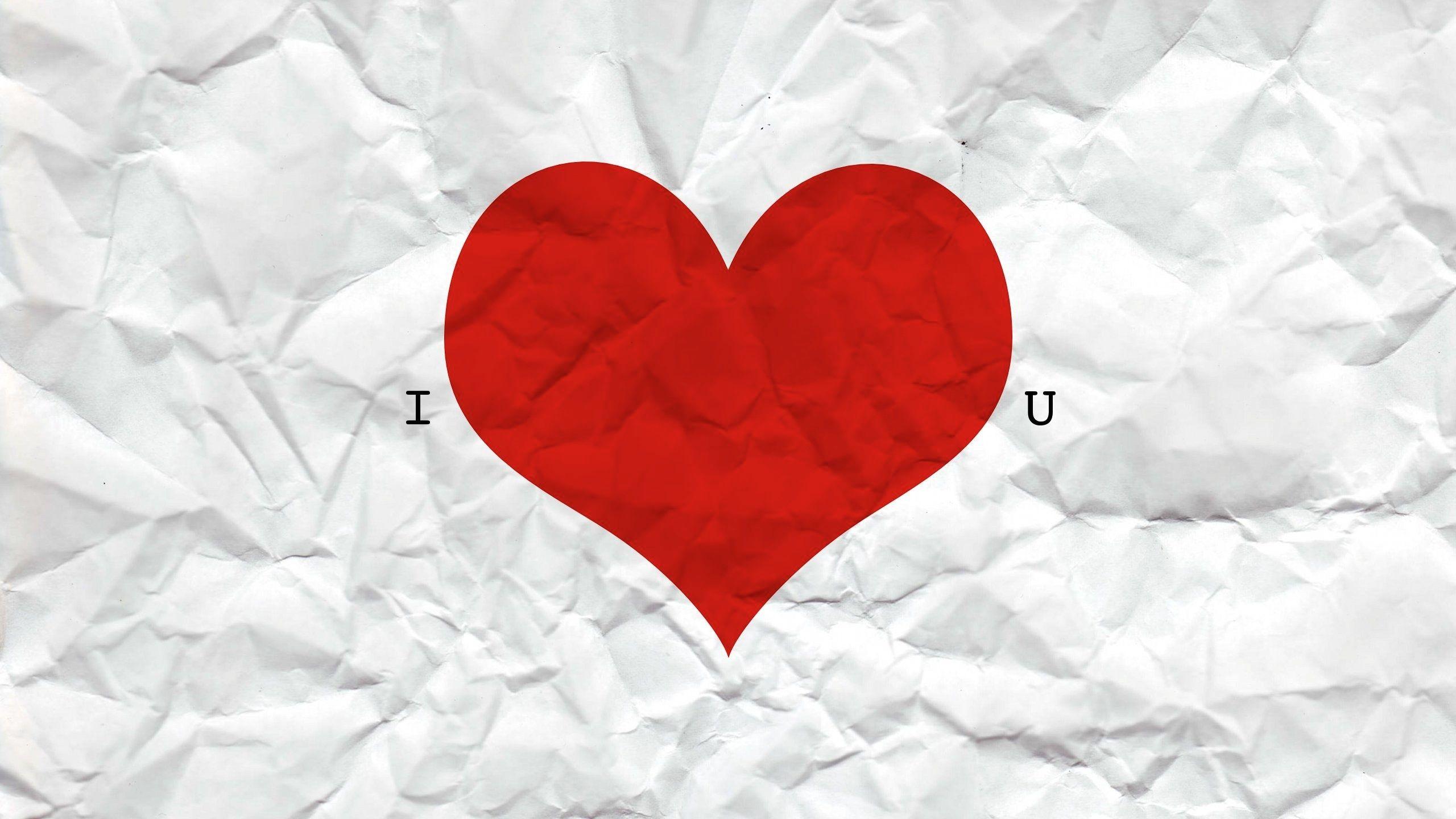 2560x1440 Red Heart On Crumpled Paper Wallpaper