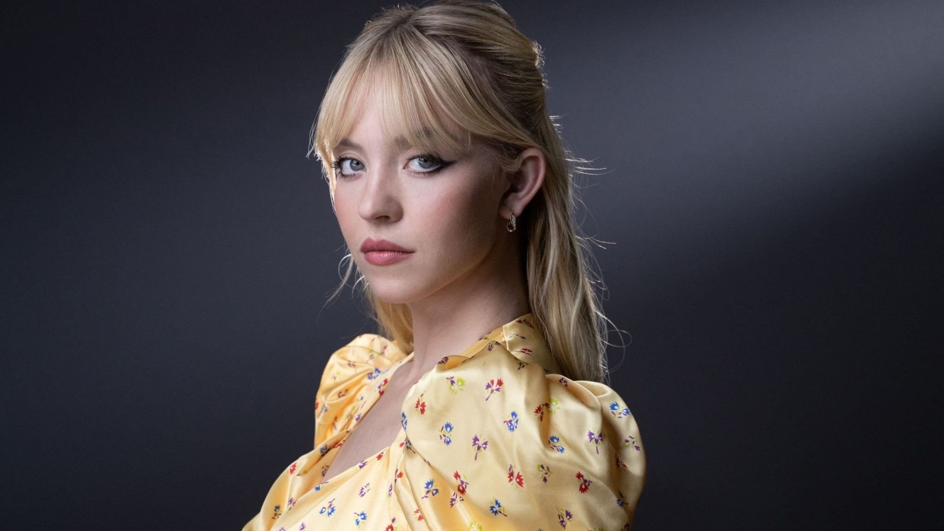 1920x1080 Beautiful Actress Sydney Sweeney Is Wearing Yellow Dress HD Girls Wallpaper