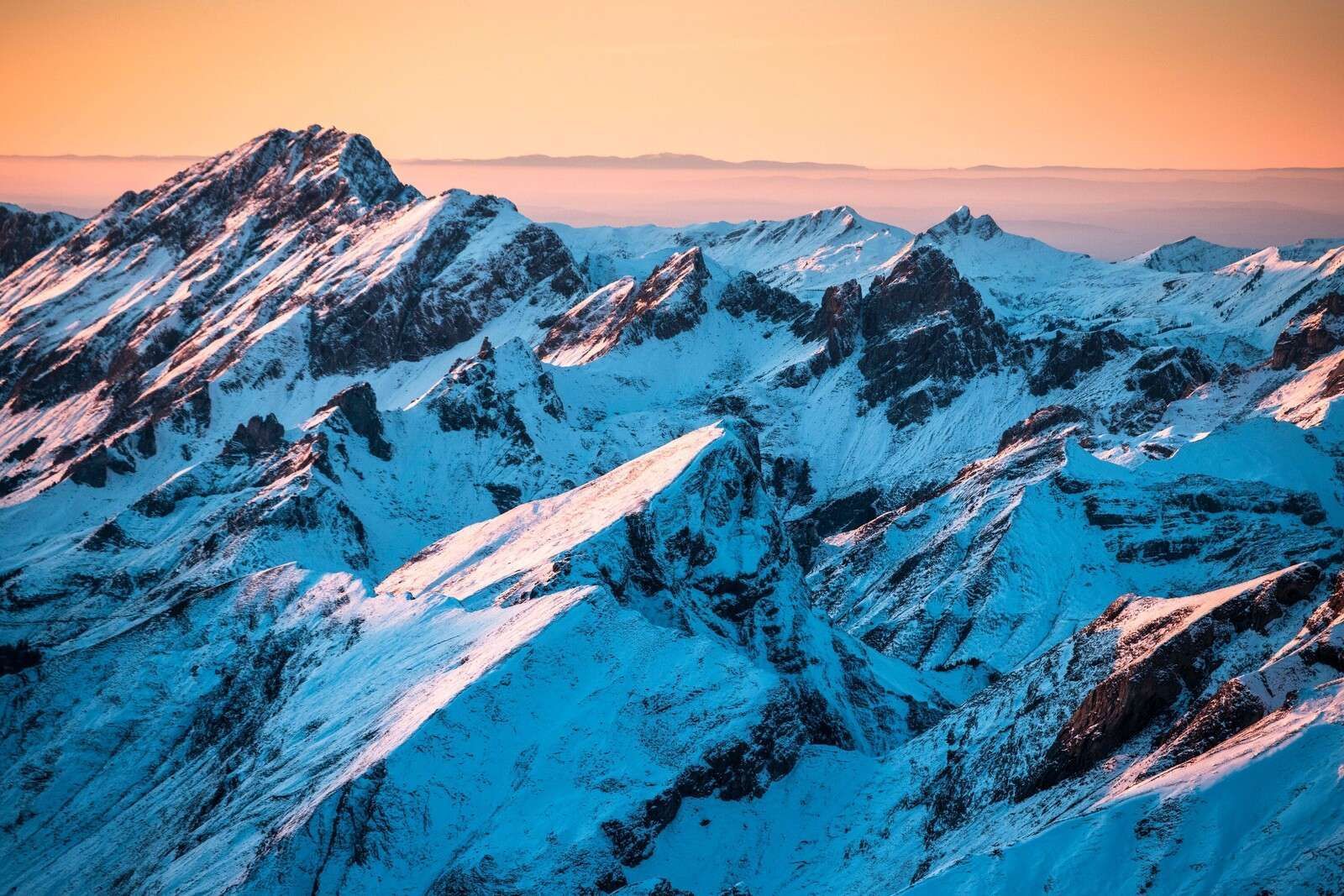 1600x1067 Wallpaper Mural Over Snow Covered Mountain Range