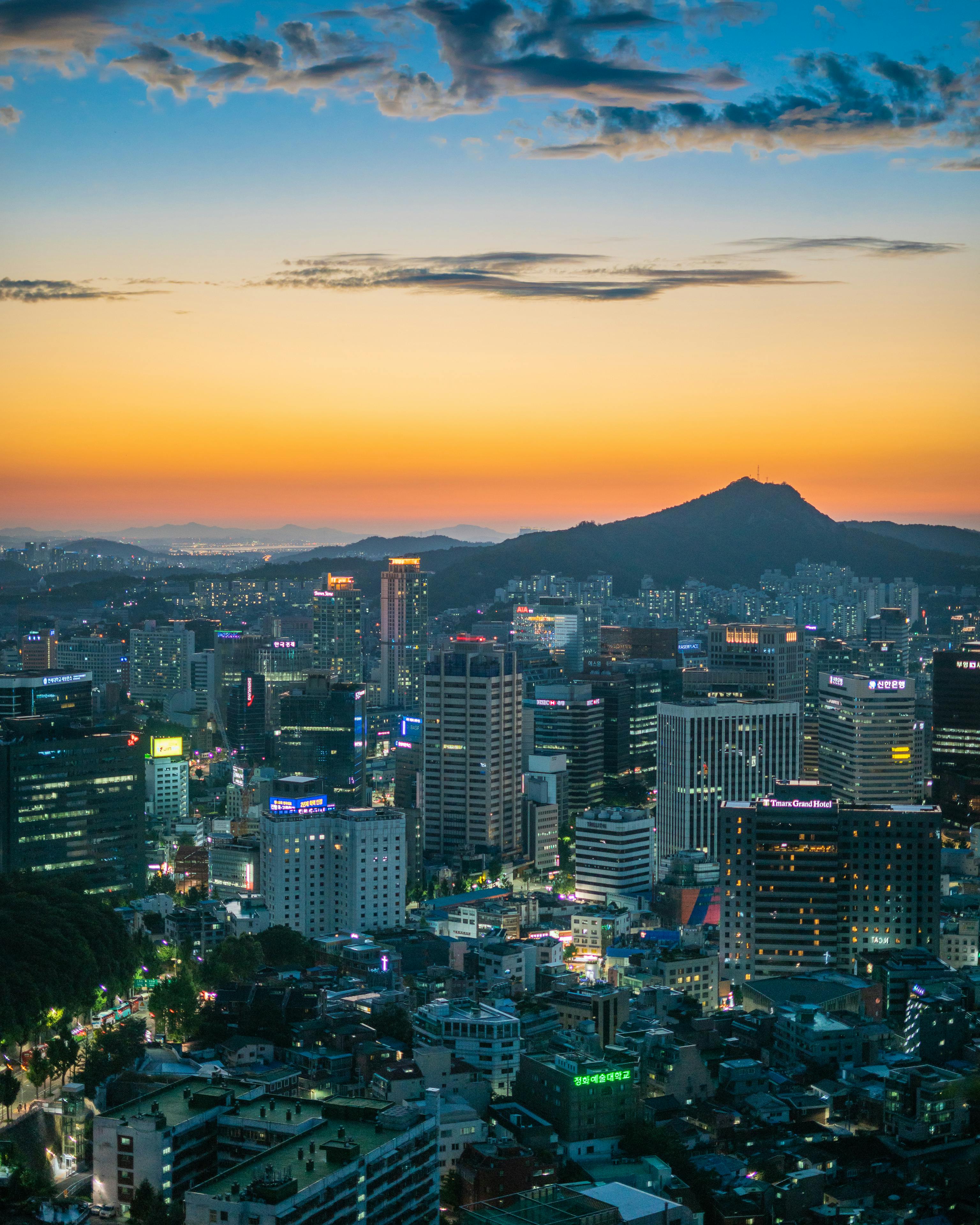 3072x3840 Photo of Cityscape During Golden Hour · Free