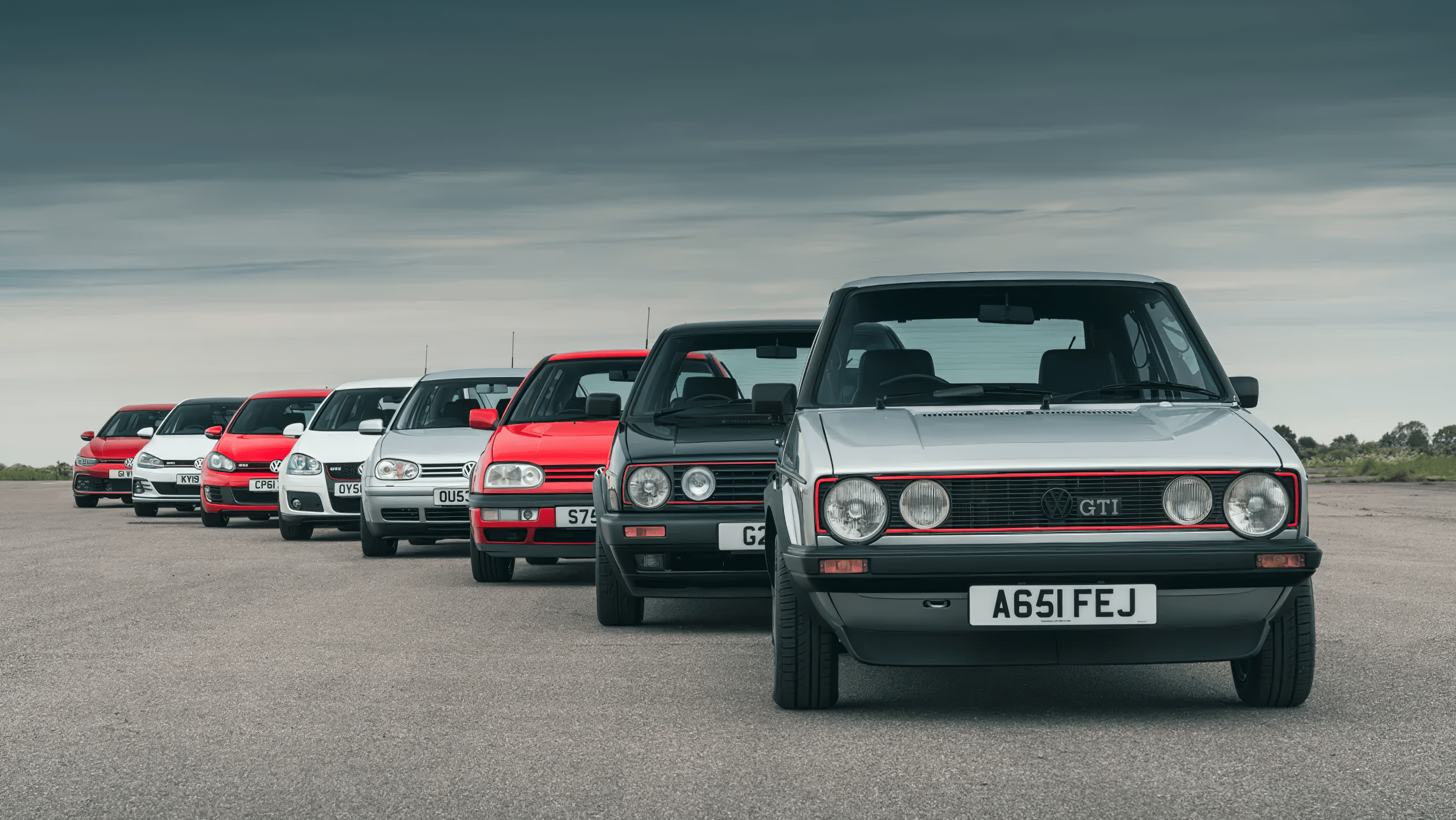 2520x1420 Have some wallpaper to share with you guys! All the generations of GTI's (AI Upscale)