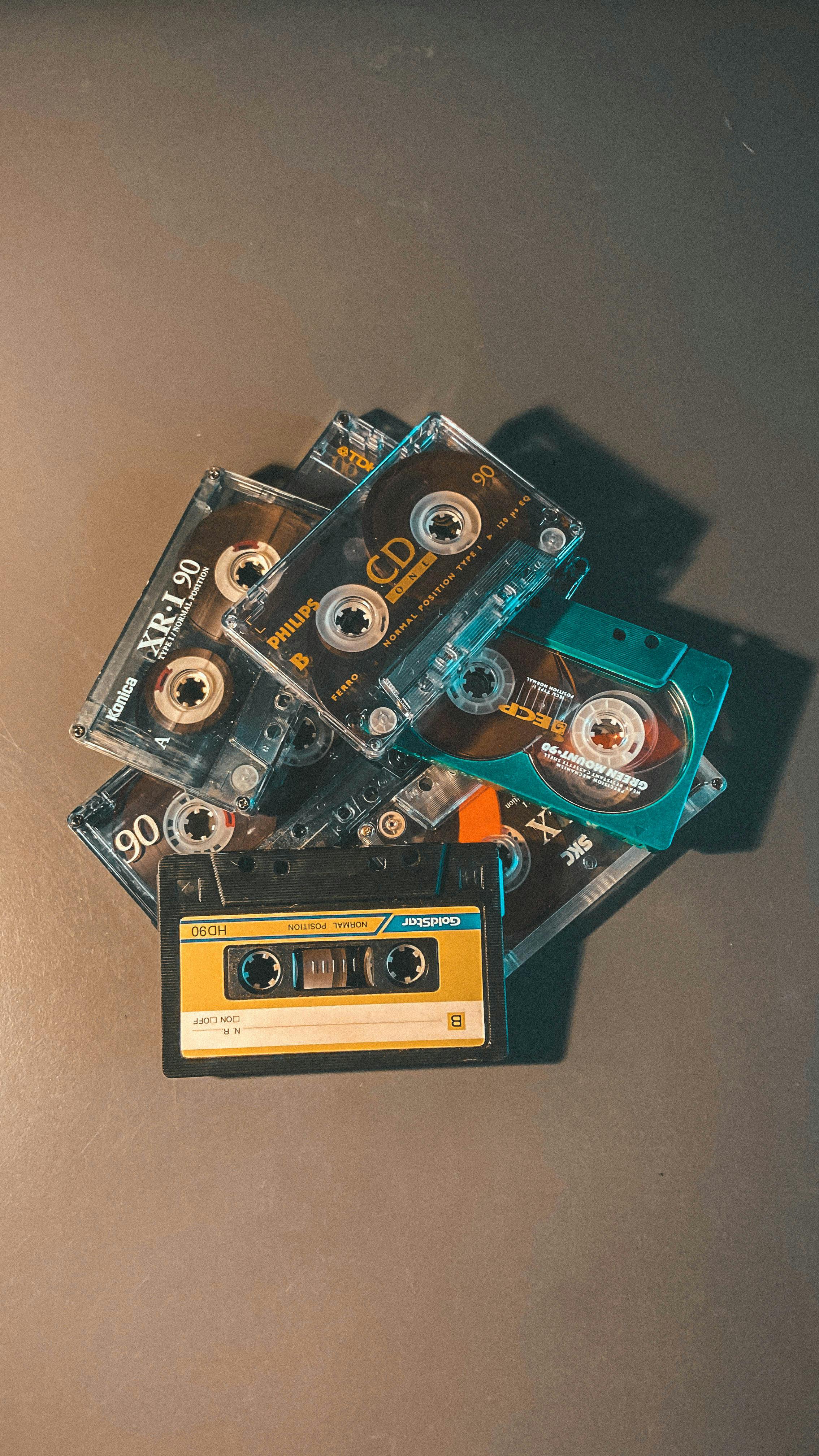 2268x4032 Cassette Tapes on a Black Surface · Free