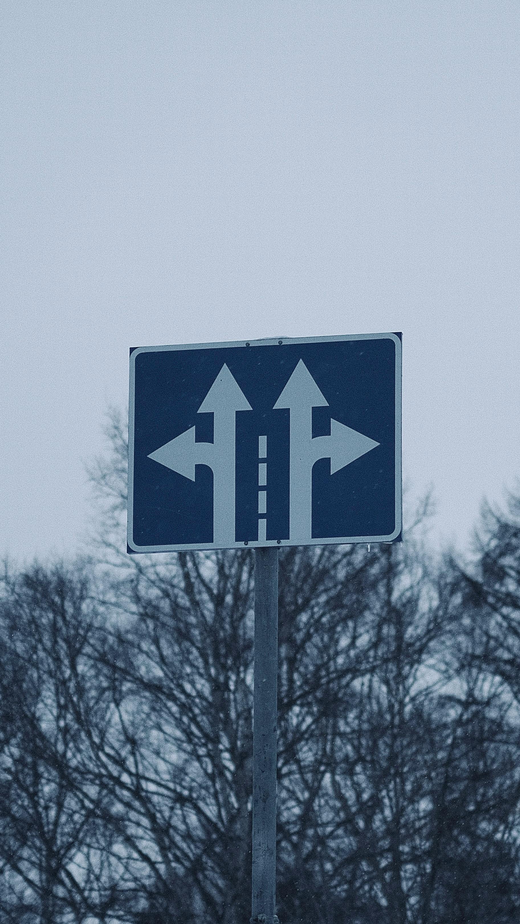 1825x3243 Close Up Shot Of A Blue Arrow On The Wall · Free