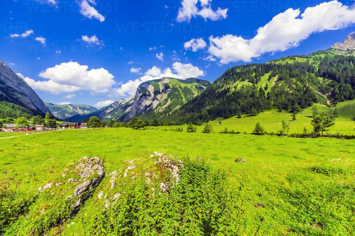 1232x819 Austria, Tyrol, Vomp, Scenic view of green Lower Inn Valley in summer with village in background