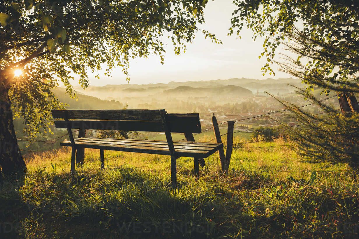 1232x821 Austria, Styria, wine route, Bench and view to Schlossberg and Leutschach in summer against the sun