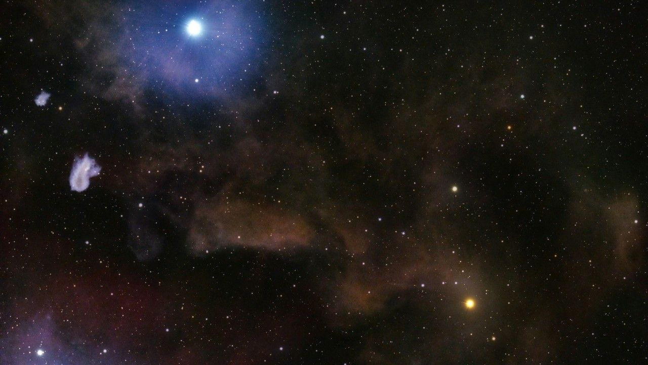 1280x720 Mesmerizing Cosmic Scene Showing A Bright Blue Star Illuminating Surrounding Interstellar Dust And Nebulae, Set Against A Star Filled Background 4K HD Space Wallpaper