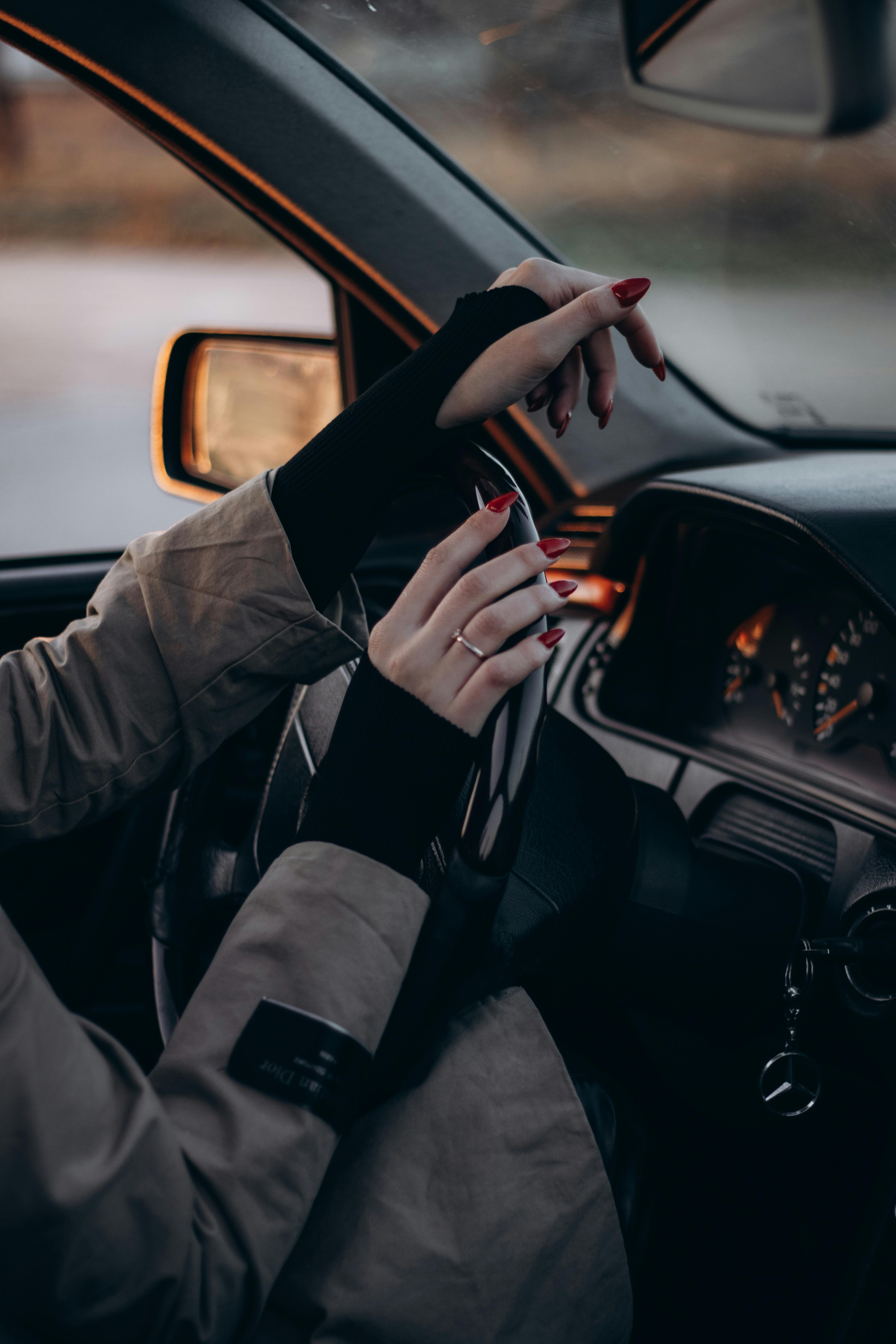 4000x6000 Elegant Woman Driving at Sunset · Free