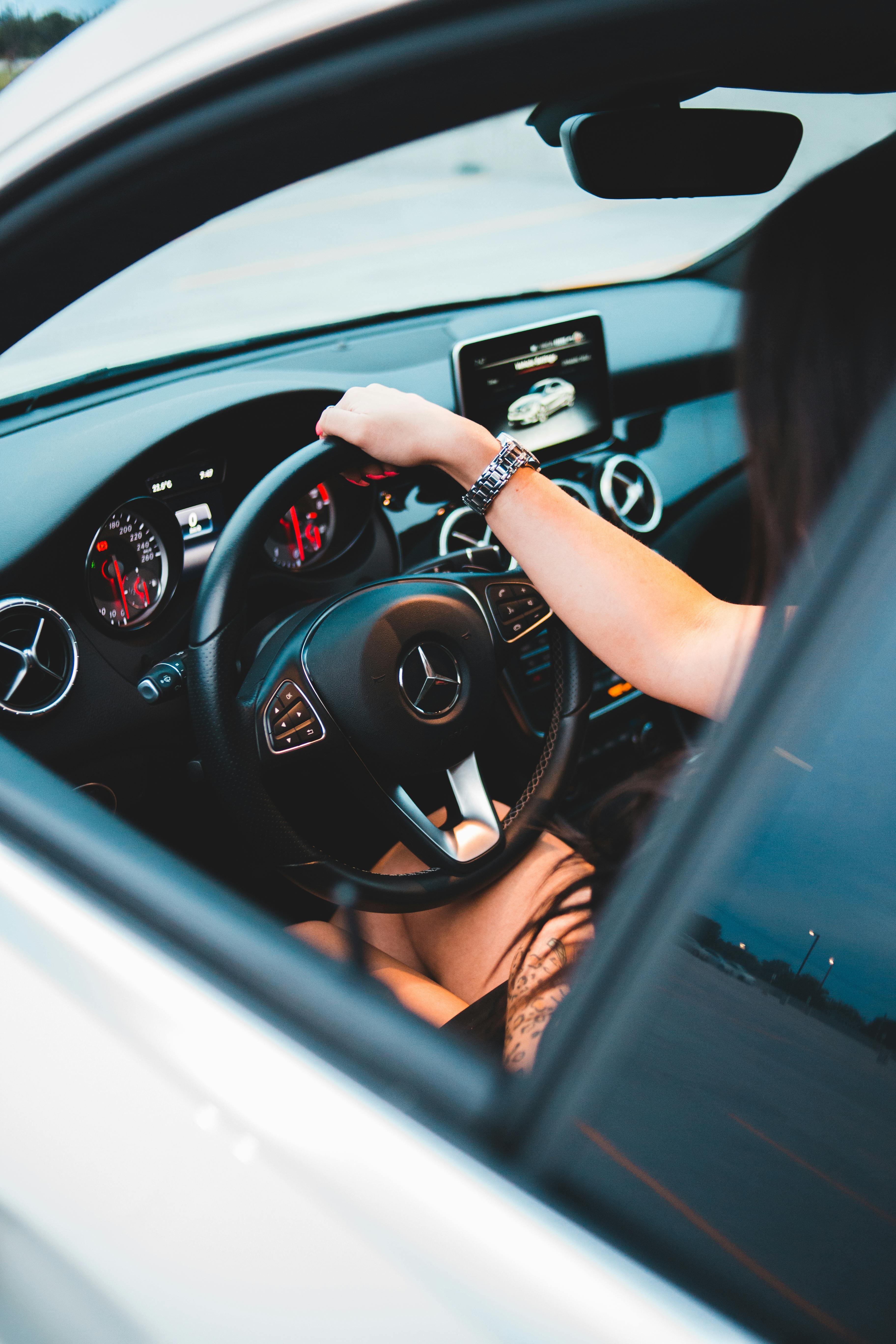 3648x5472 Faceless woman driving car in daytime · Free