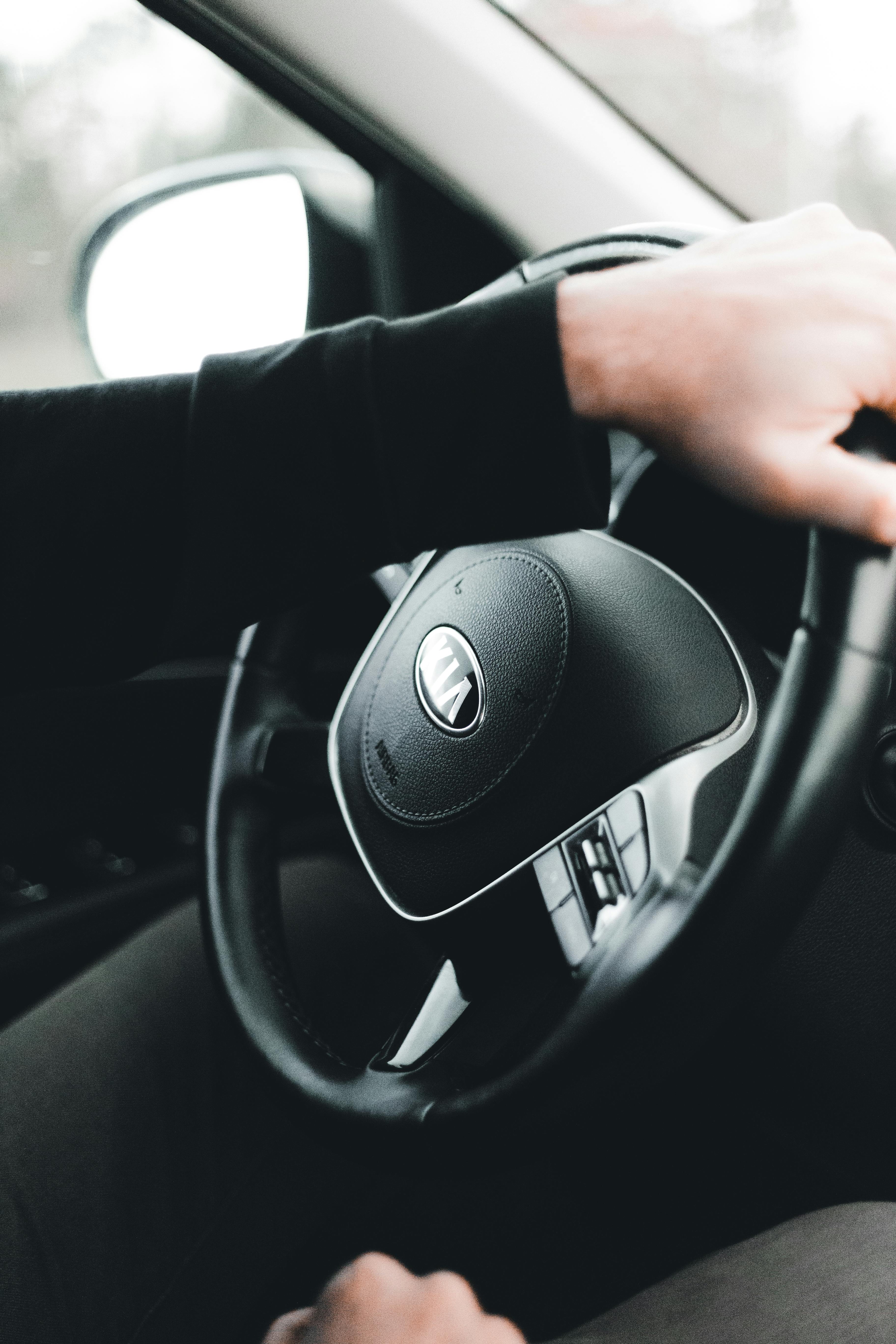 3648x5472 Close Up Photo Of A Person's Hands Driving A Car · Free