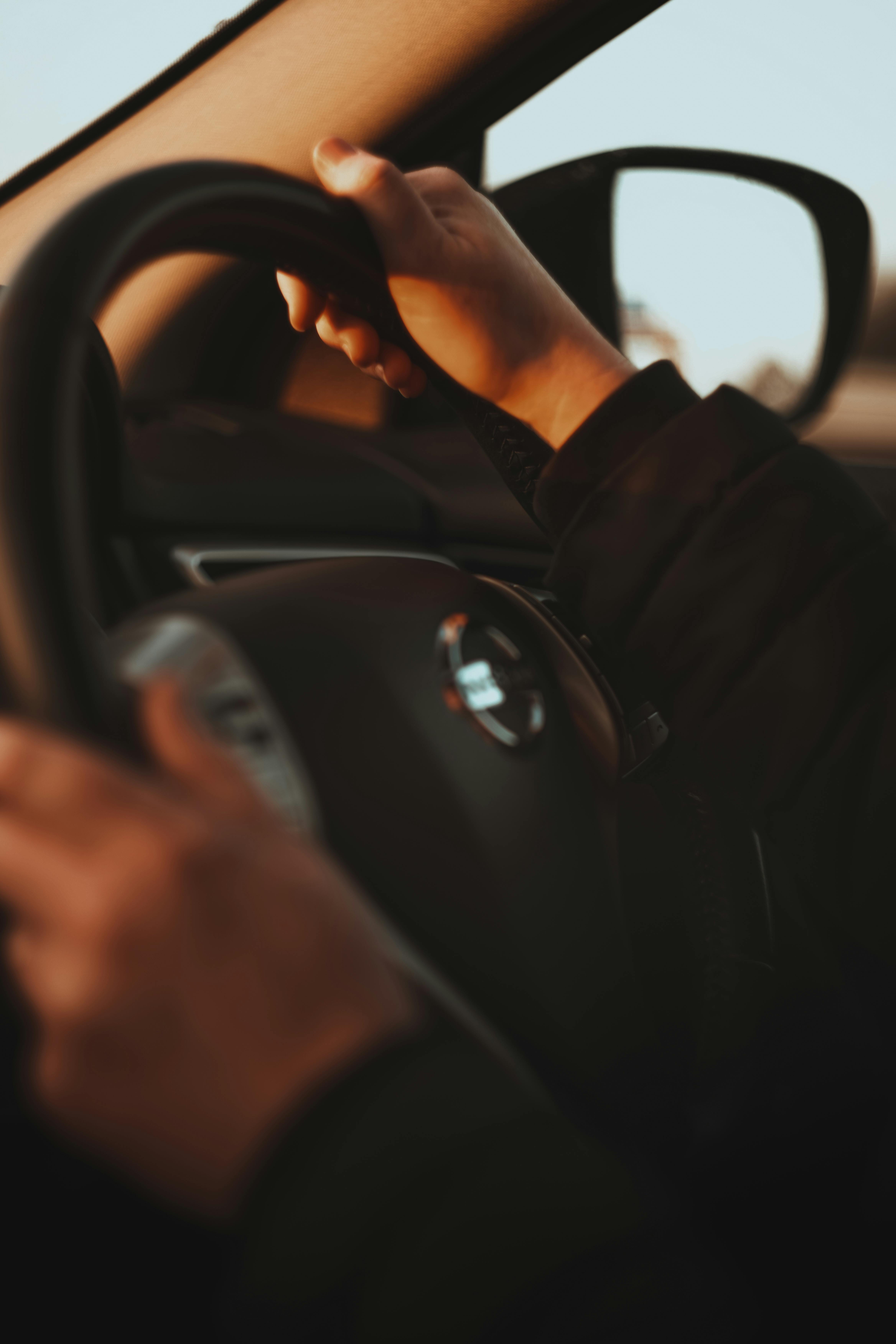 4672x7008 Close Up Shot Of A Person Driving A Car · Free