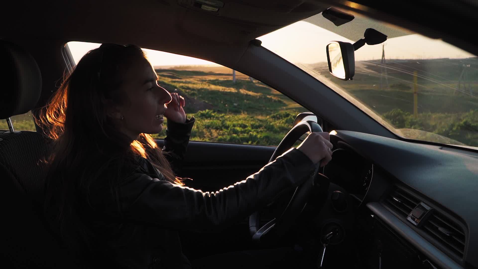 1920x1080 young woman driving the car outside the window beautiful sunset landscape