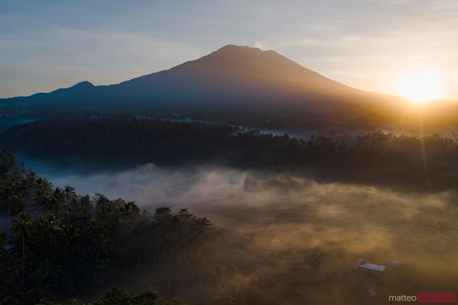 1600x1066 Mt Agung volcano and foggy valley at sunrise, Bali. Royalty Free Image