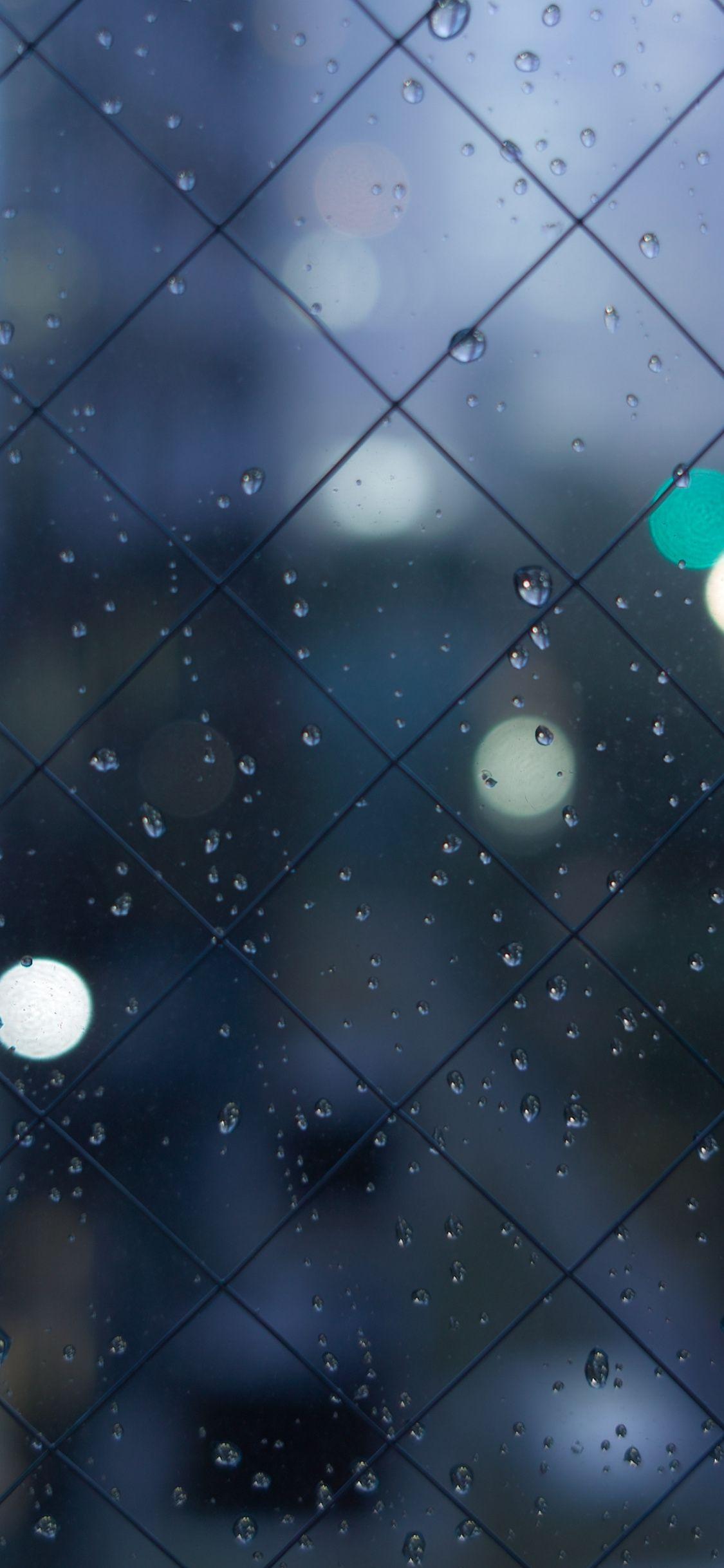 1125x2436 Rain drops, surface, window glass, fence wallpaper, 5280x HD