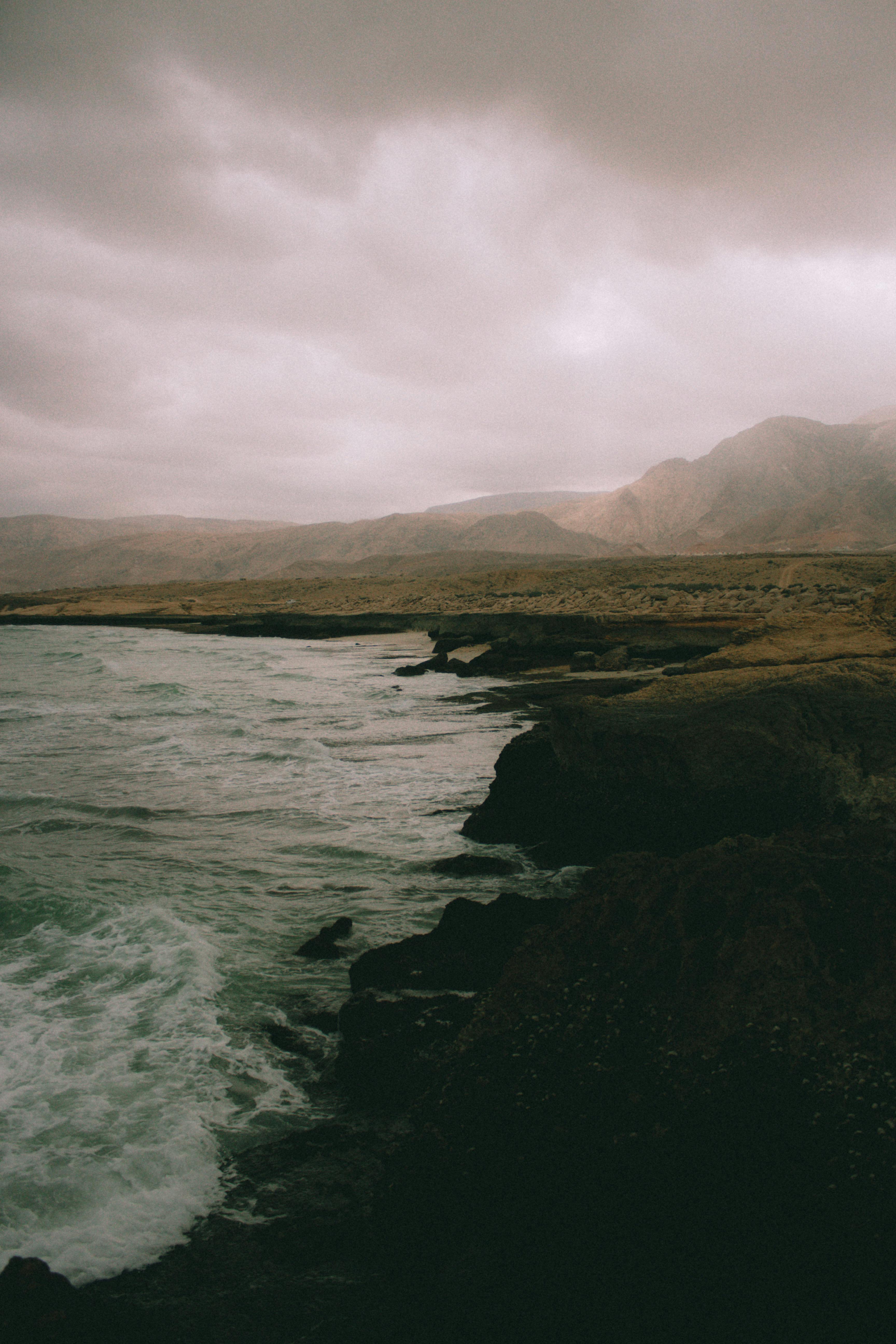 3456x5184 Waves Crashing onto Misty Shore · Free