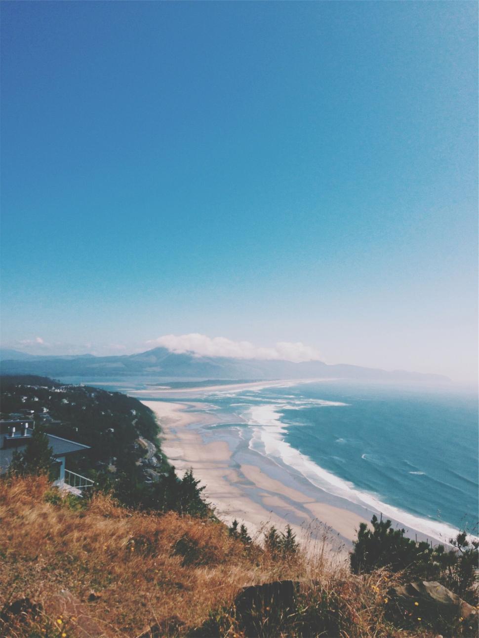 970x1293 Free of Coastal landscape with expansive beach and distant mountain views. Download Free Image and Free Illustrations