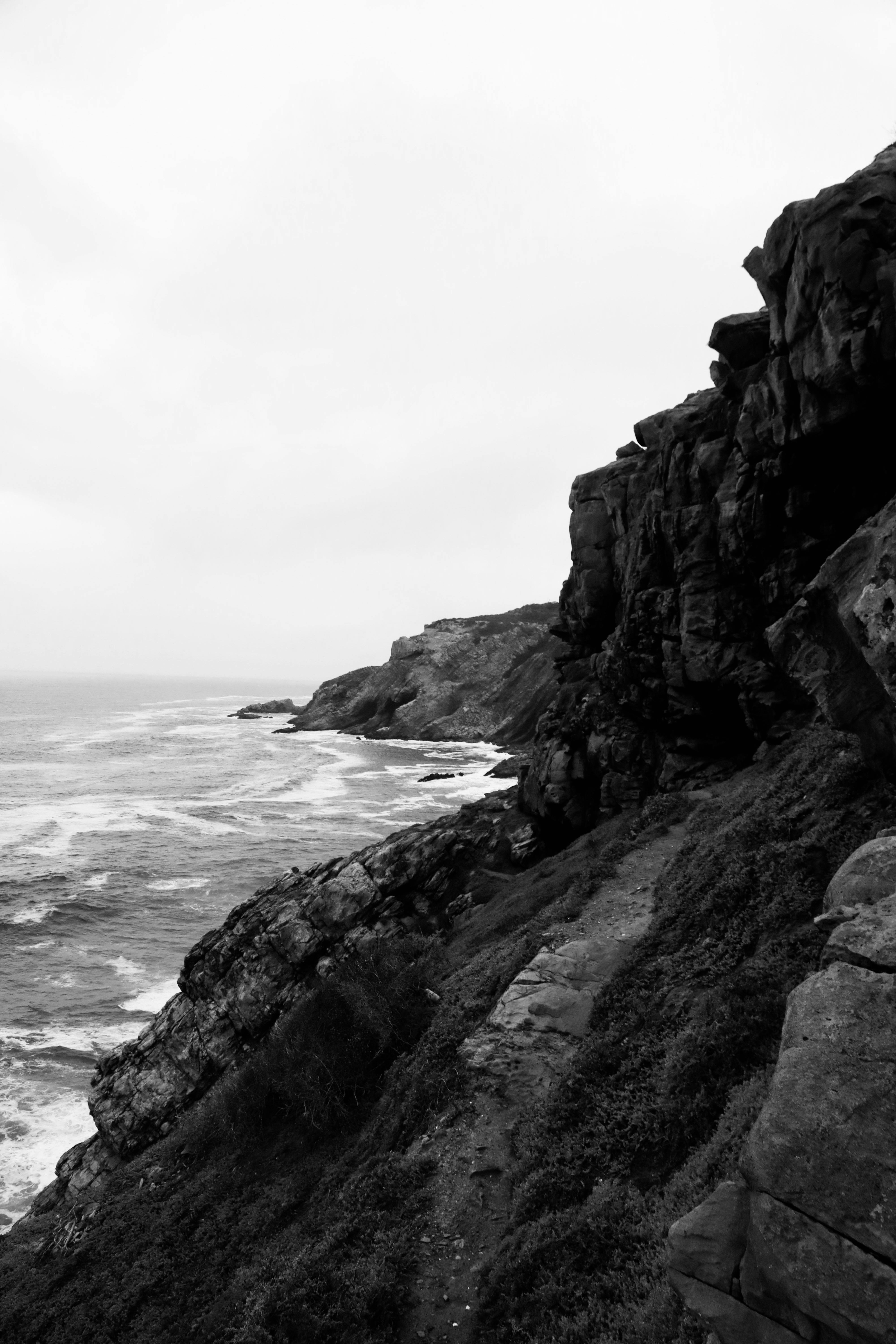 4000x6000 Dramatic Black and White Coastal Cliffside View · Free