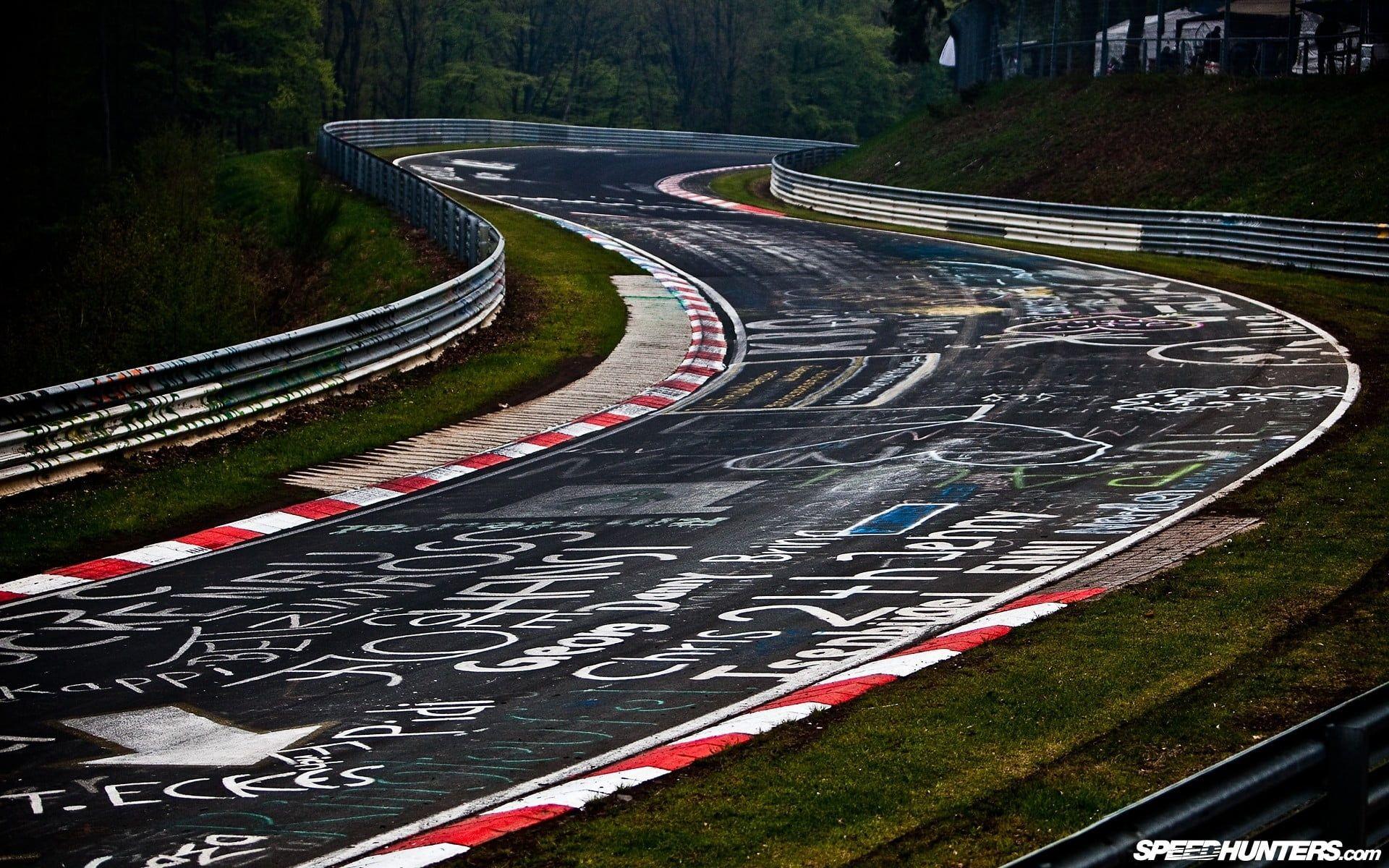 1920x1200 Gray and red racetrack, nurburgring, race tracks, road, graffiti