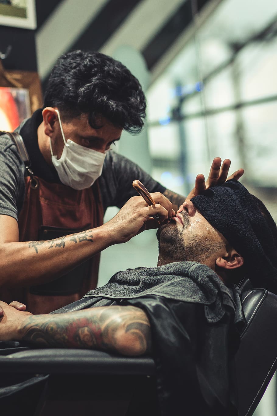 910x1365 HD wallpaper: Man Shaving Man's Beard Using Straight Razor, barber