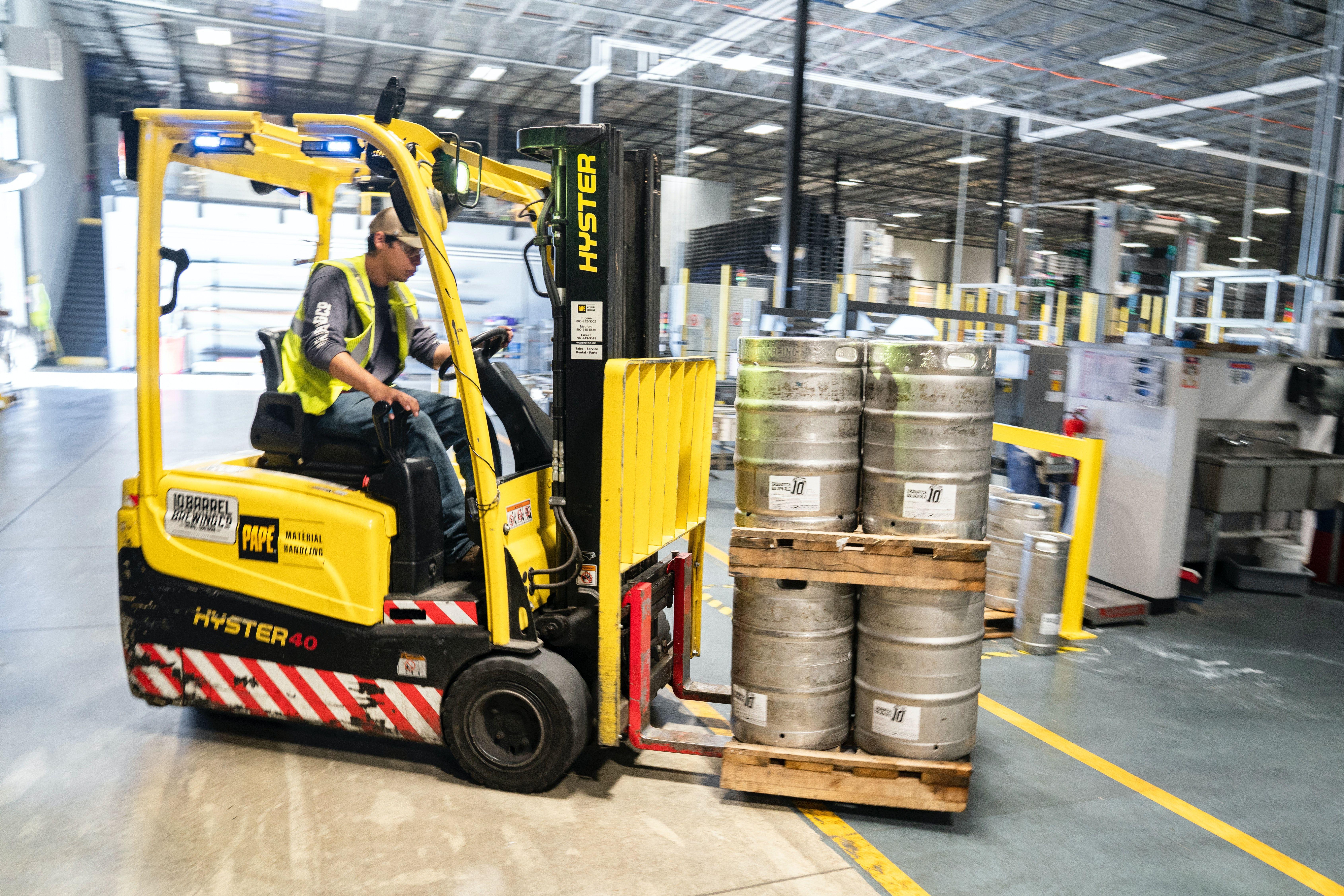 6760x4509 Person Driving Yellow Forklift · Free