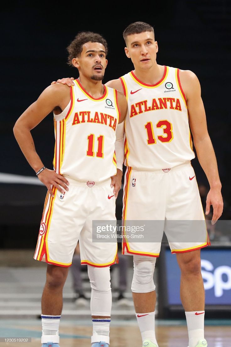 736x1104 Trae Young and Bogdan Bogdanovic of the Atlanta Hawks talk against