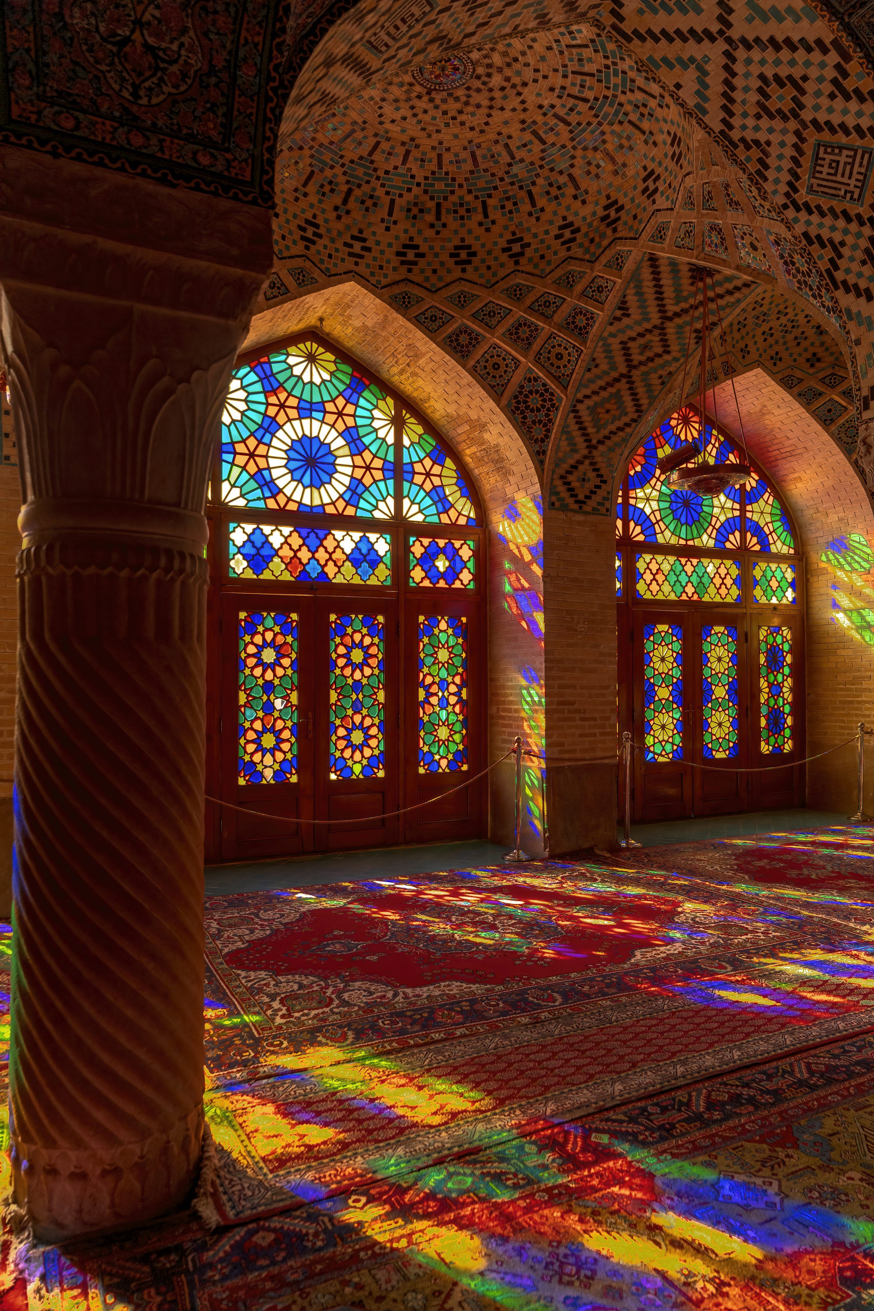 3000x4500 A large room with stained glass windows in it photo