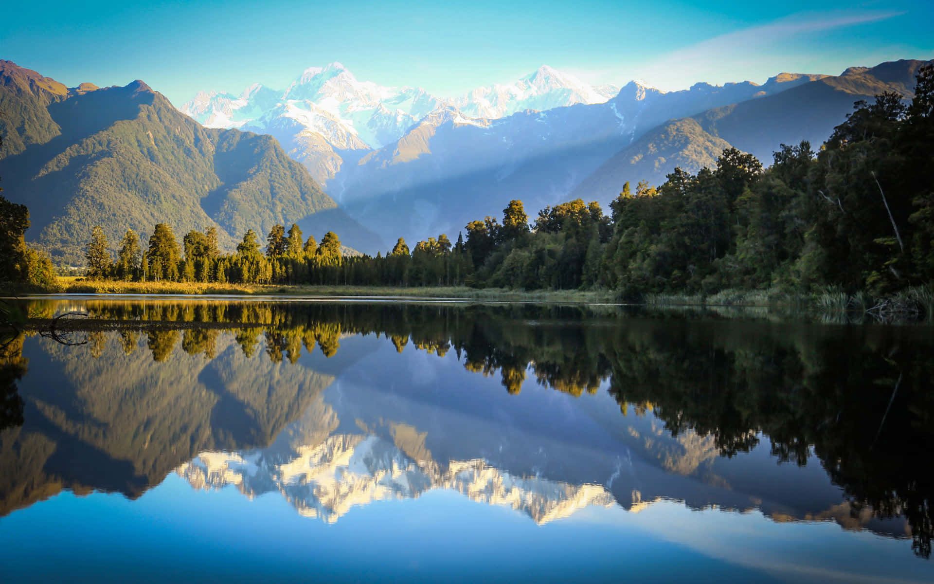 1920x1200 Download A Lake With Mountains Reflected In It