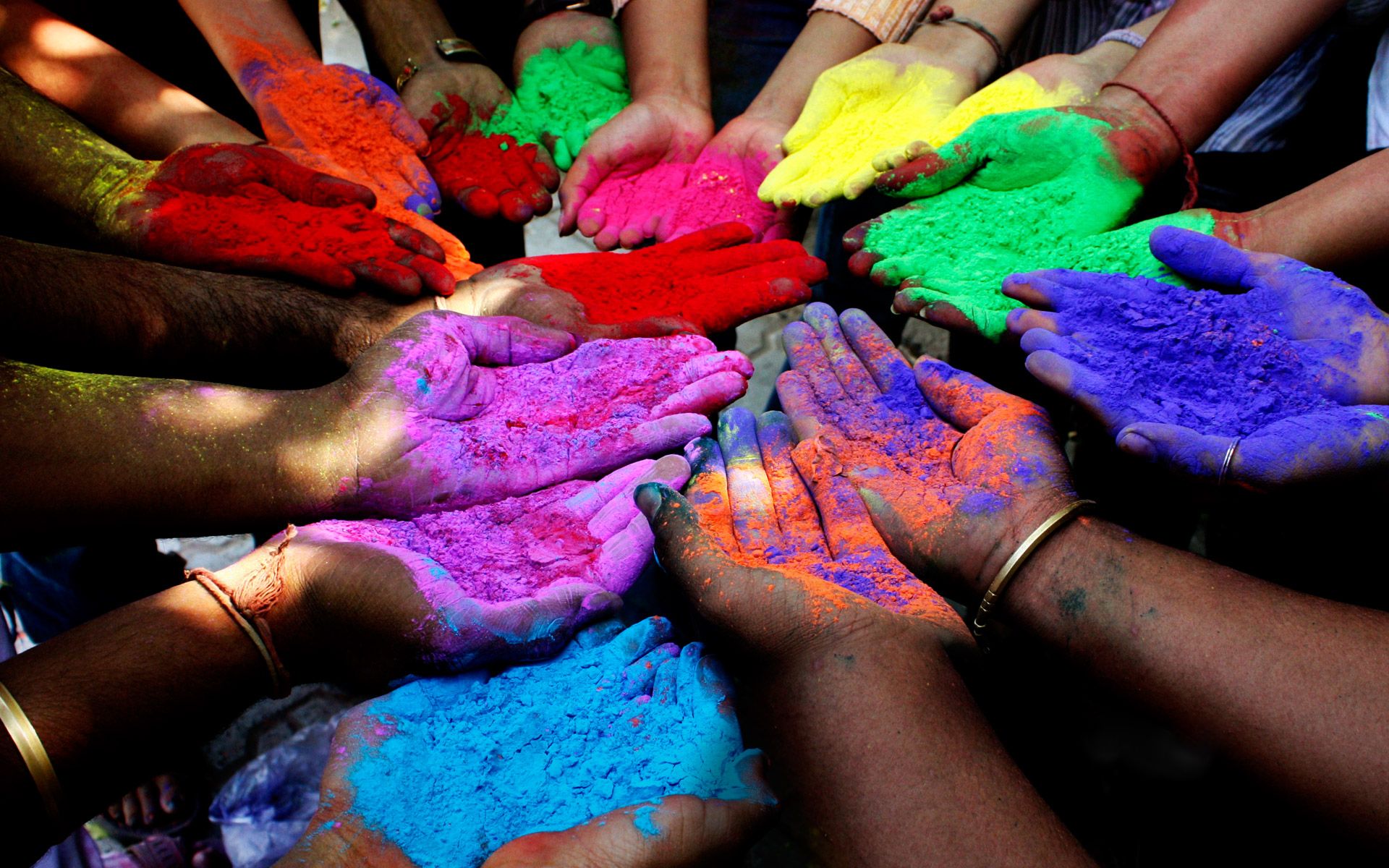 1920x1200 Vibrant Hands of Holi: A Colorful HD Wallpaper Celebration