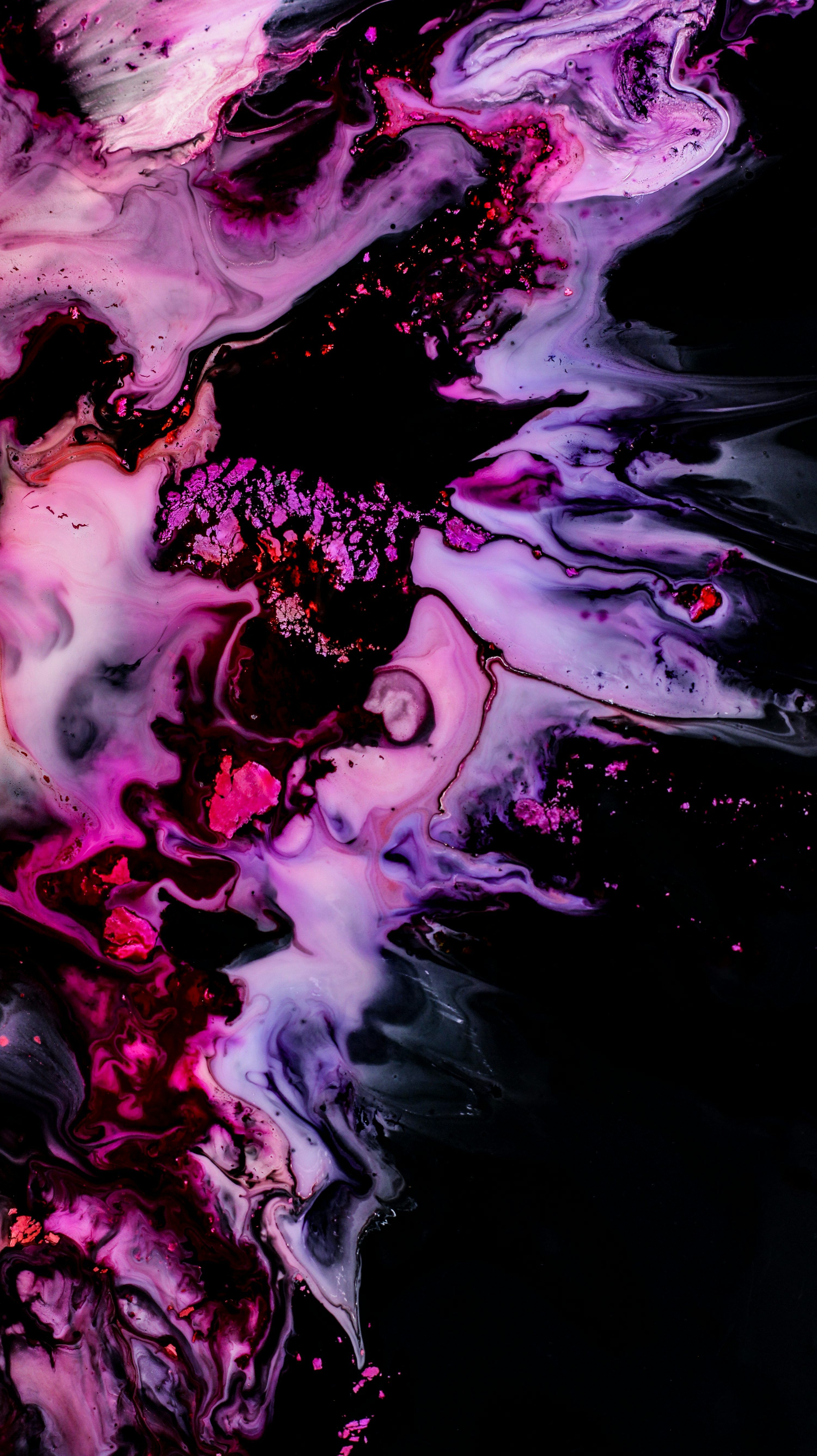 3000x5344 A close up of a black and purple liquid photo