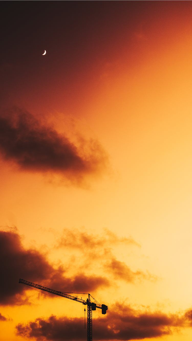 750x1334 industrial crane during golden hour iPhone 8 Wallpaper Free Download