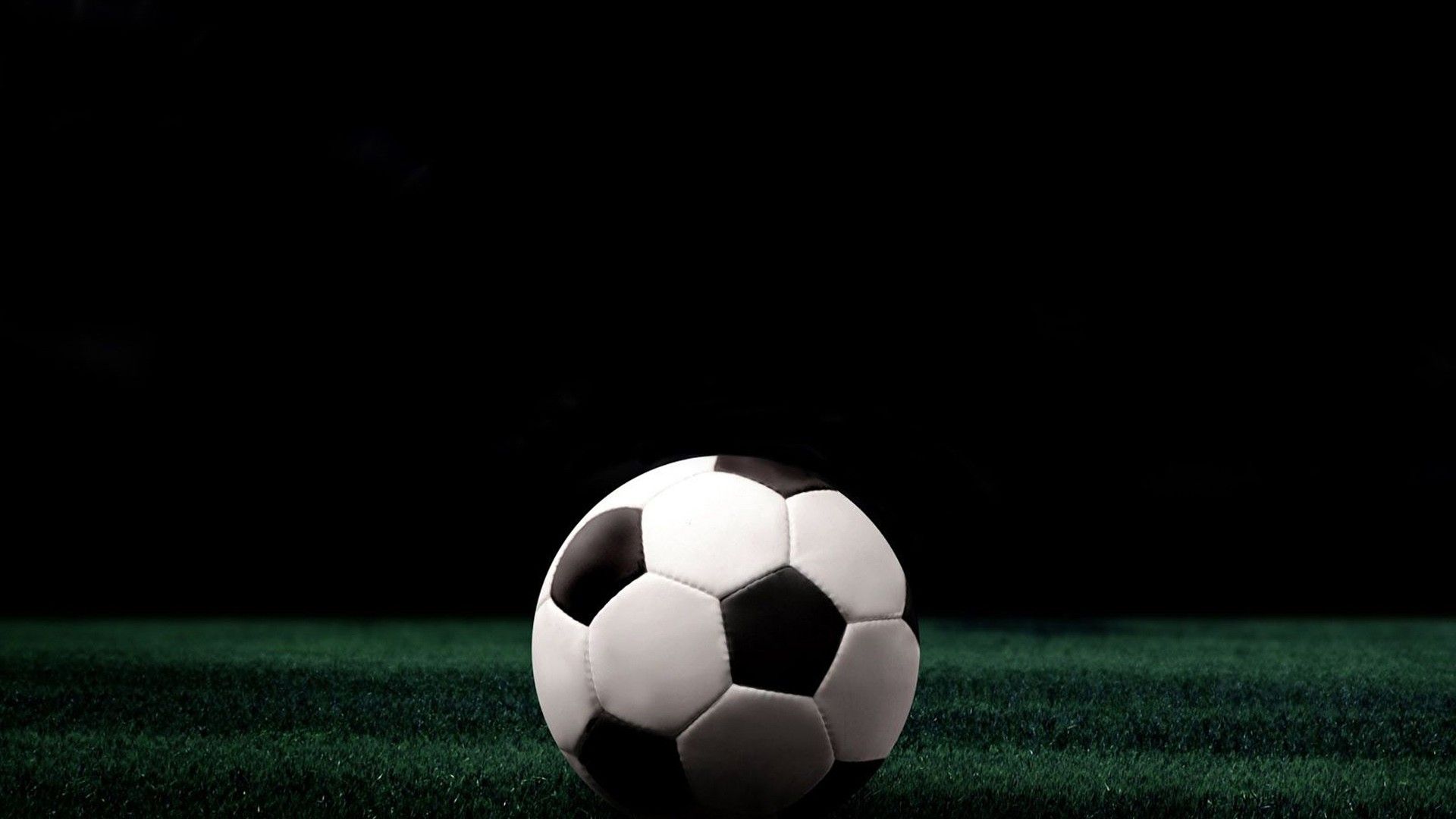 1920x1080 White Black Football On Green Grass In Black Background HD Football Wallpaper