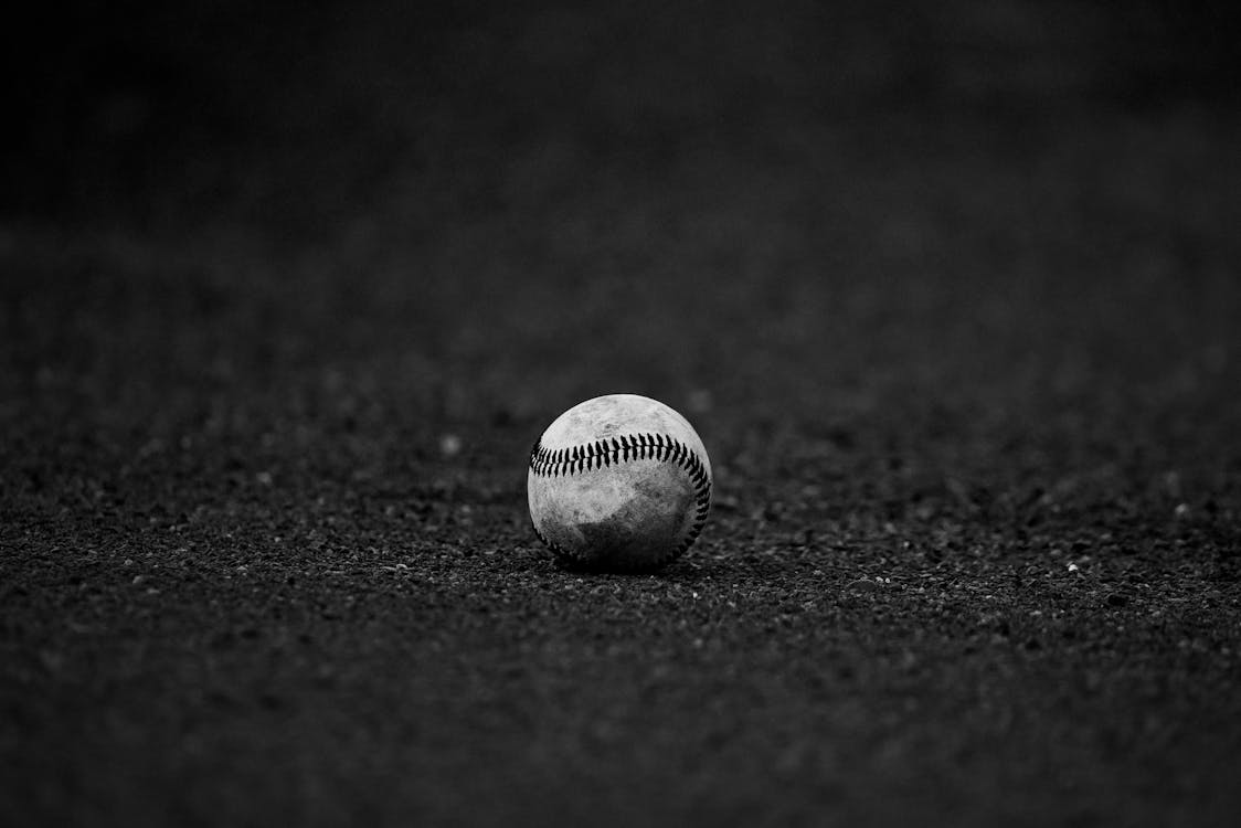 1124x750 Selective Focus Grayscale Photography of Baseball · Free