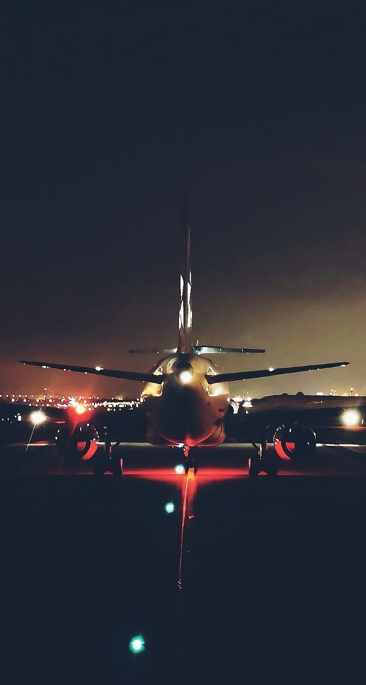 720x1348 Nighttime Airplane on Runway