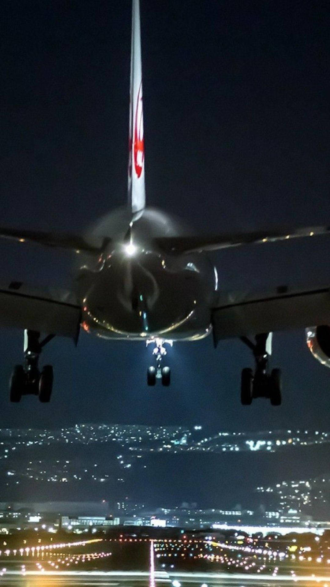 1080x1920 Download An airplane taking off in the evening sky Wallpaper