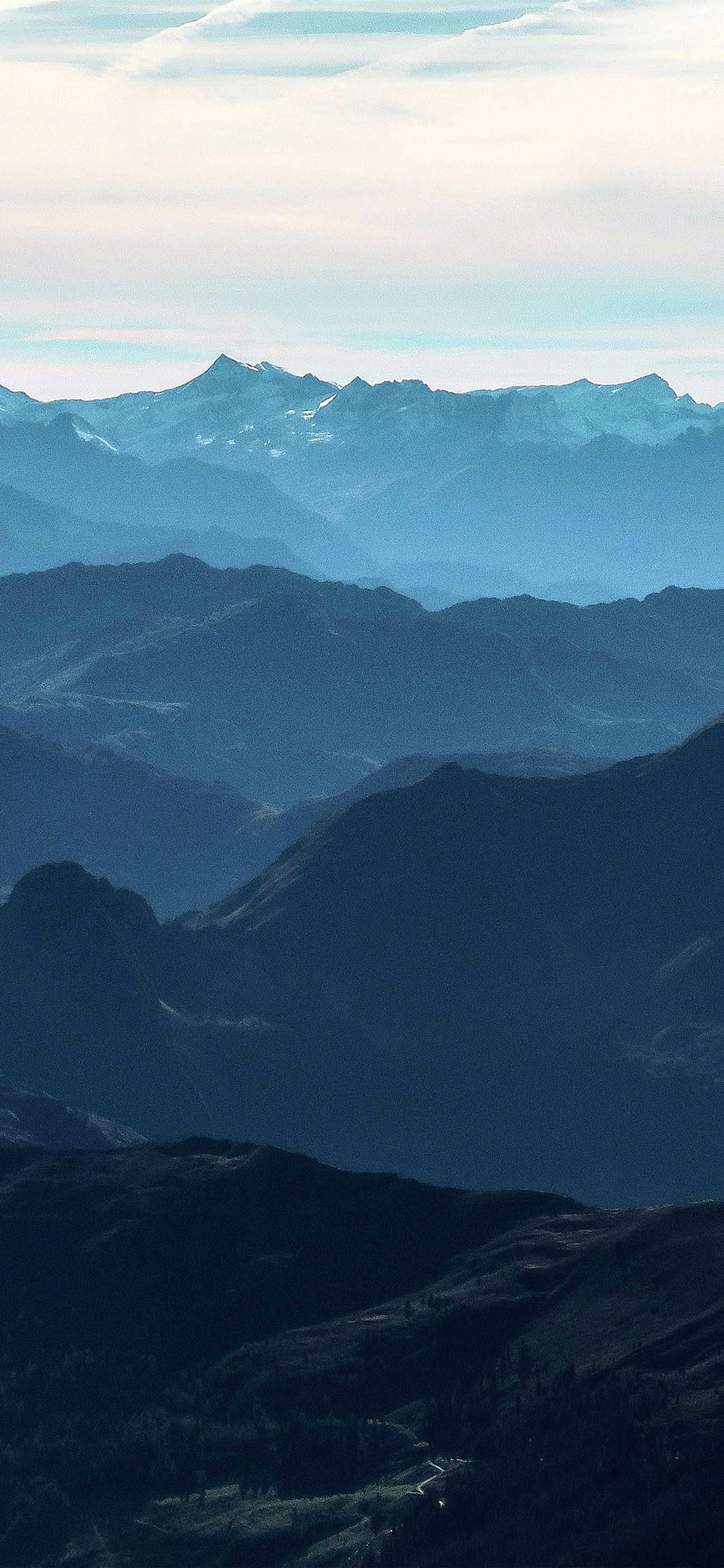 1125x2436 iPhone X wallpaper. morning mountain fog blue sky nature view