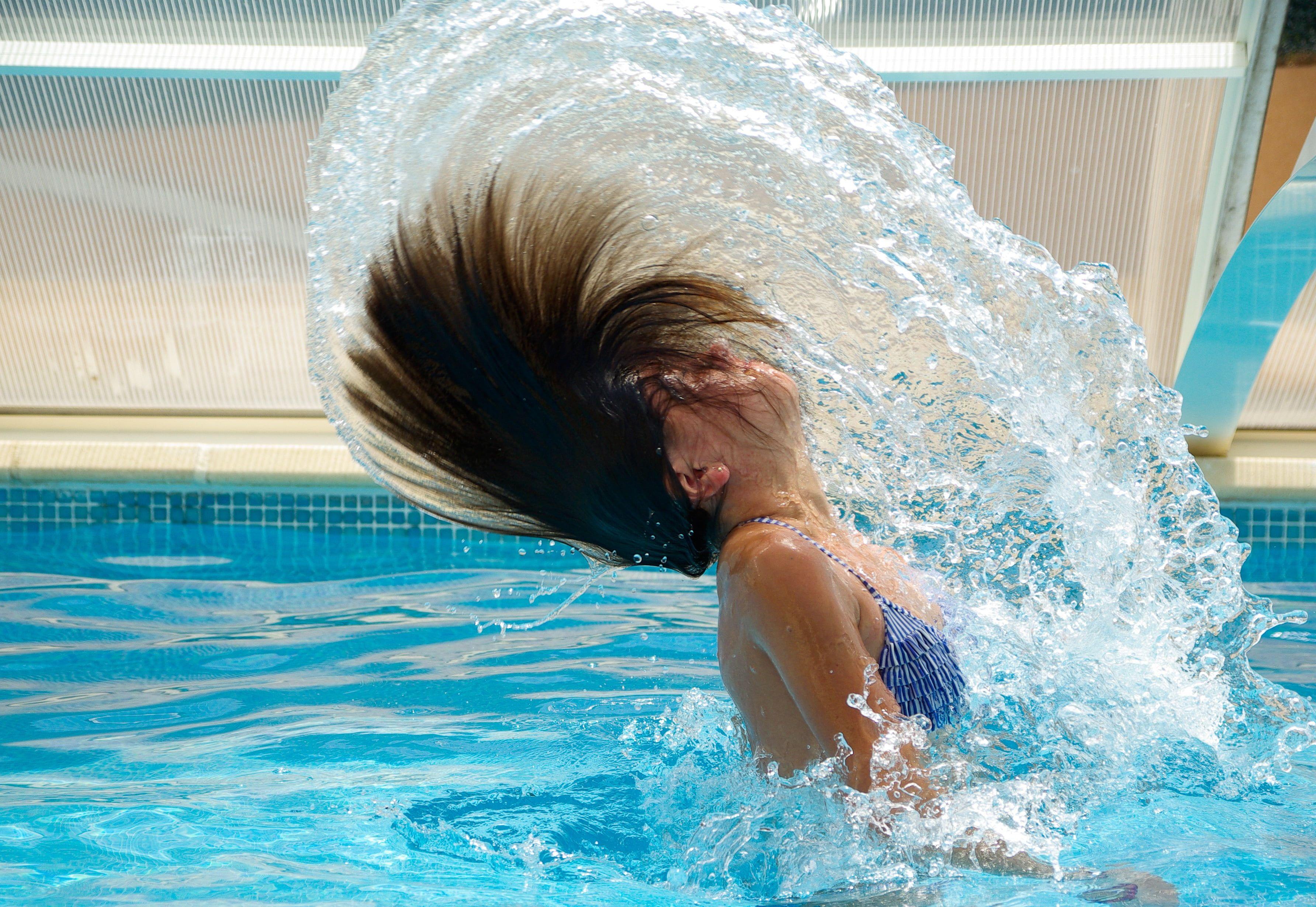3568x2459 Women splashing her hair in pool HD wallpaper