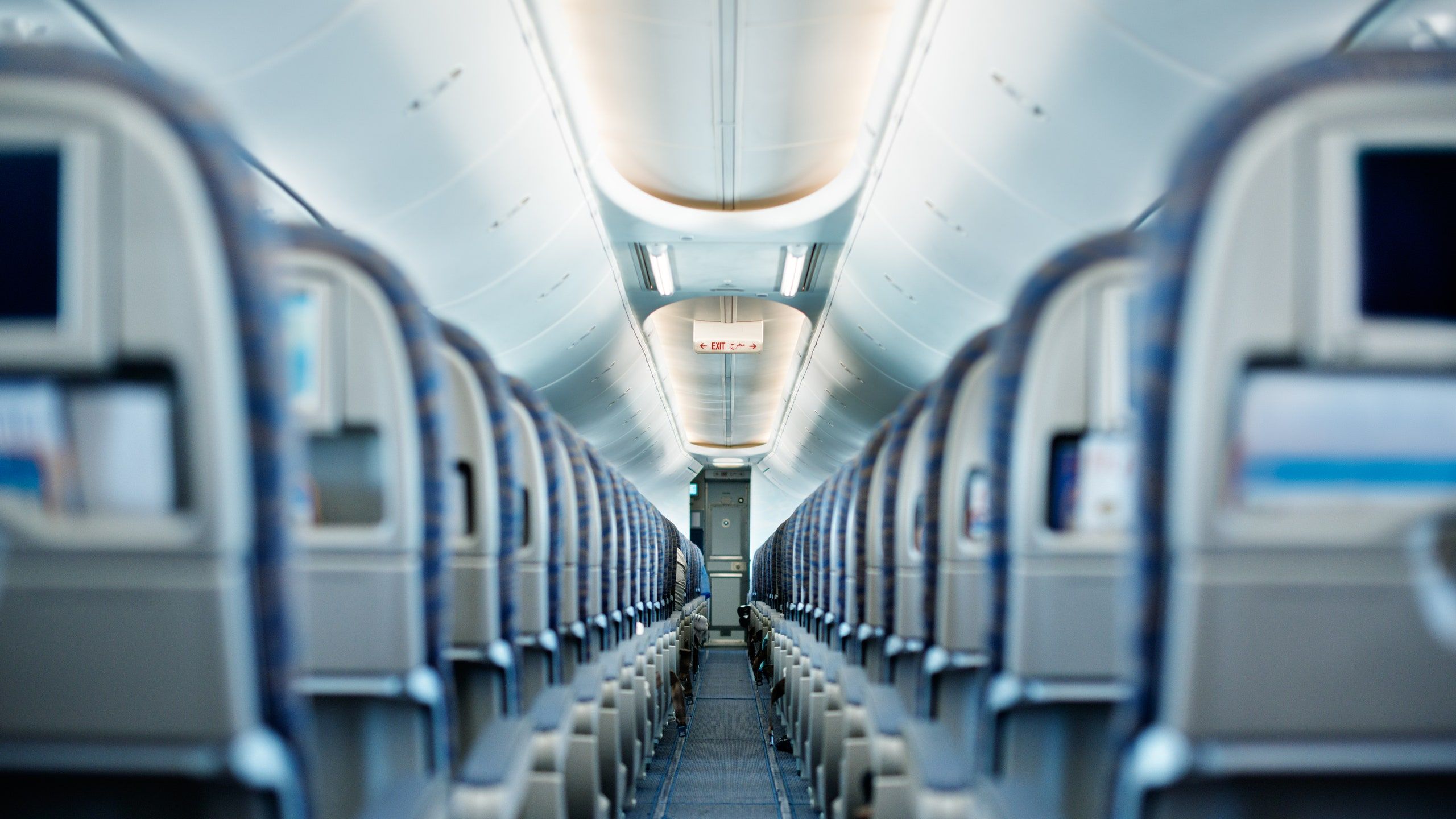 2560x1440 Plane Interior Wallpaper