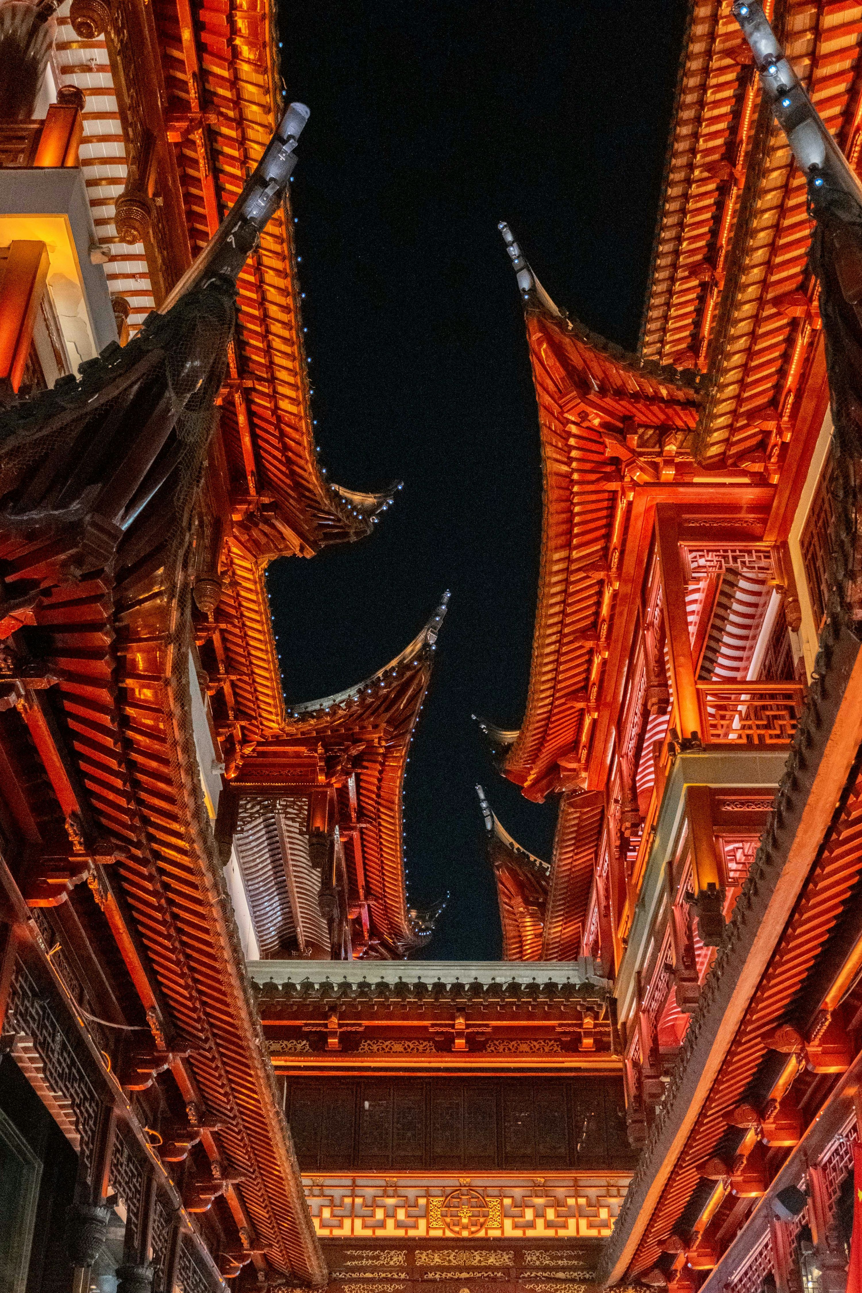 3000x4500 Glowing chinese rooftops at night. photo