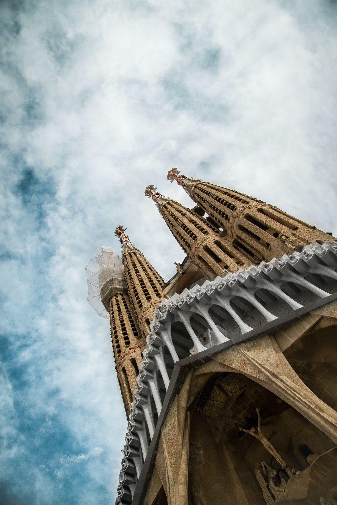 1080x1620 Low Angle Photography Of Concrete Cathedral Under Cloudy Sky Photo