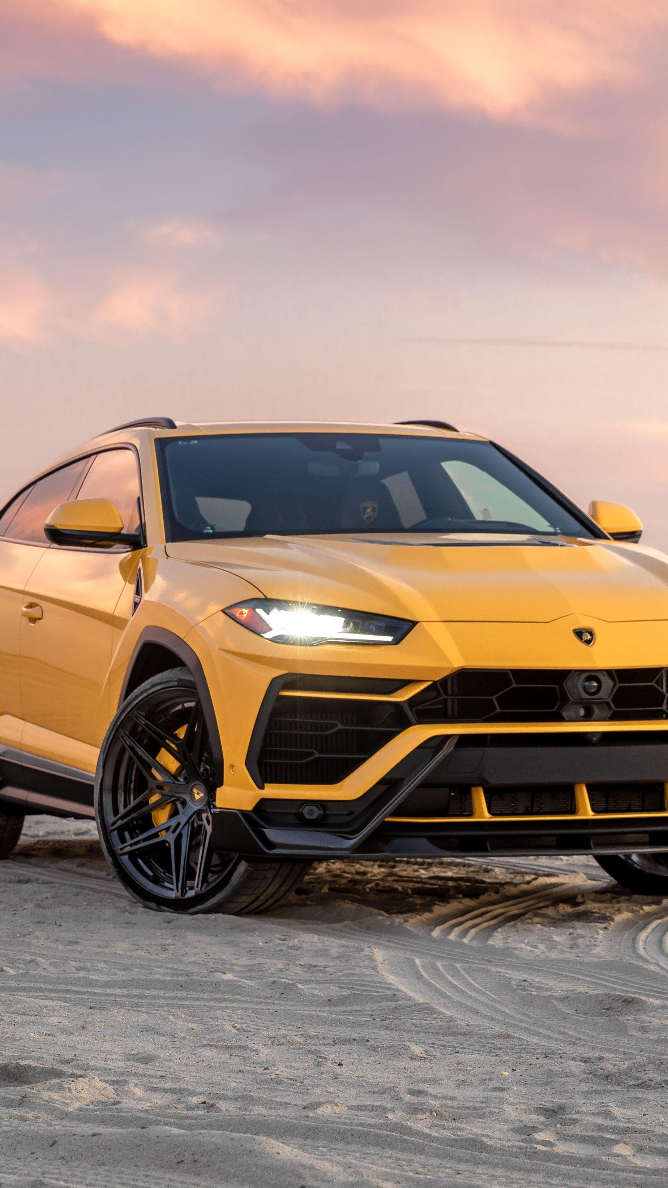 2160x3840 Yellow Lamborghini Urus, 2020 compact SUV wallpaper