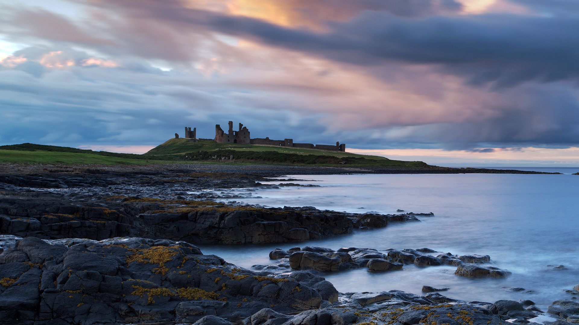1920x1080 Dunstanburgh Castle, Northumberland, England, UK. Windows Spotlight Image